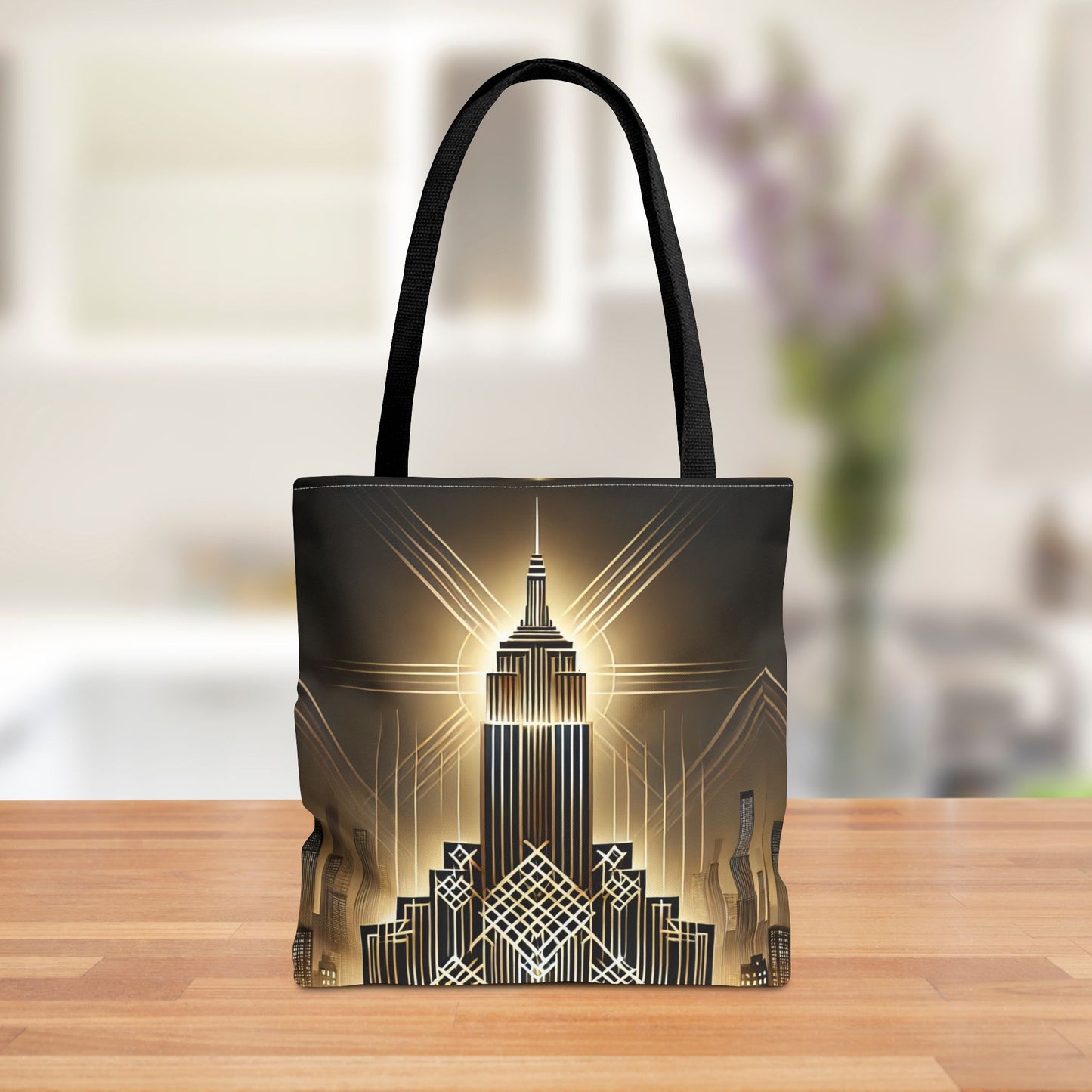Art Deco-inspired tote bag featuring a golden city skyline design with intricate geometric details, displayed on a wooden table in a modern kitchen setting.