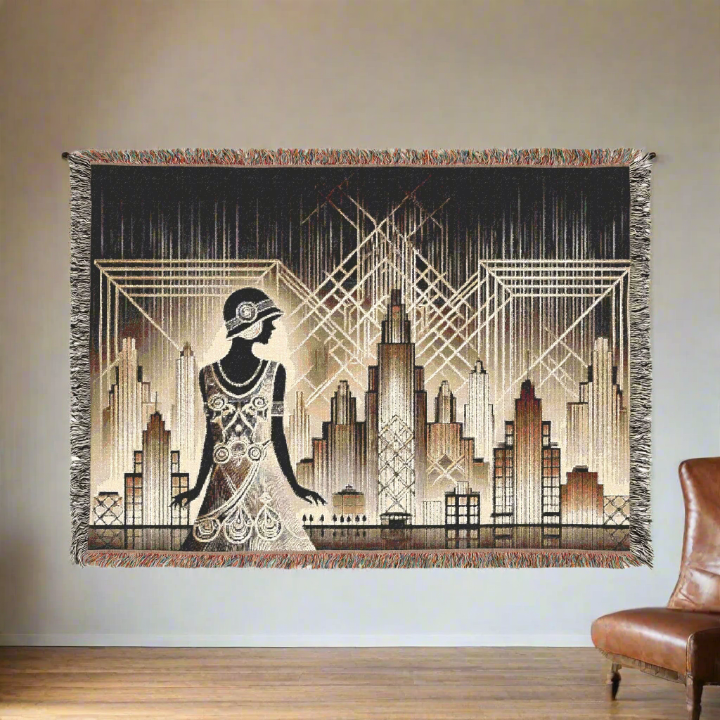 Art Deco-inspired woven blanket featuring a flapper silhouette in a glamorous dress, set against a cityscape with geometric designs in black, gold, and cream tones, hanging on a wall above a leather chair.