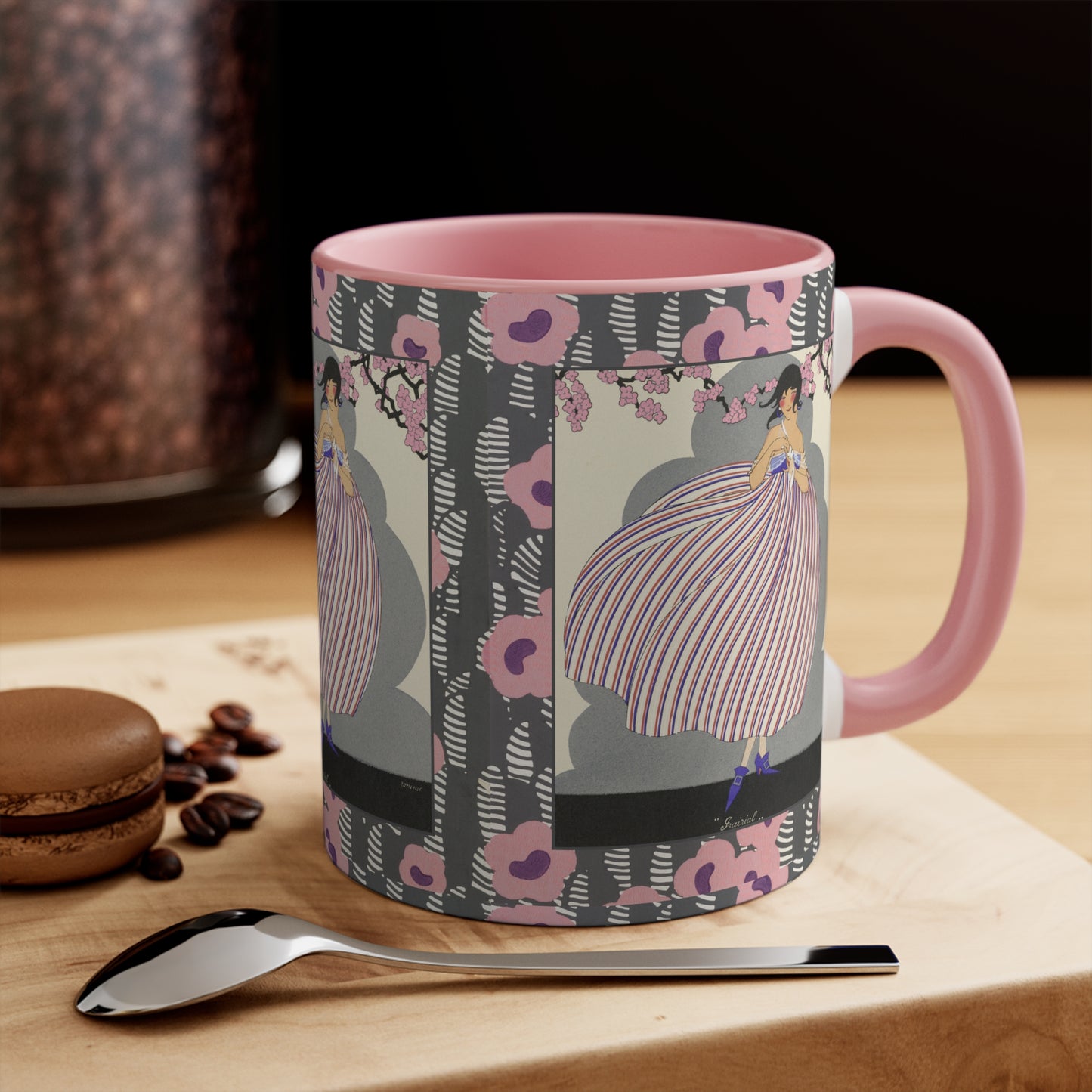 Vintage floral and striped design mug with Art Deco patterns in pink, gray, and black tones