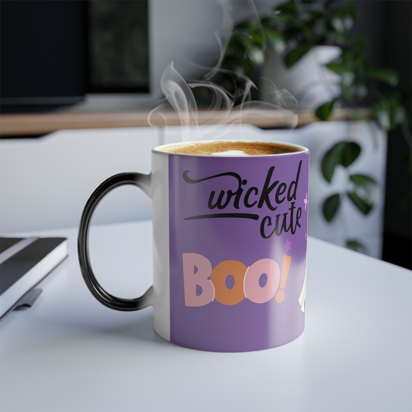 Side view of Wicked Cute Halloween Boo Magic Morphing Mug highlighting the continuation of the ghost and pumpkin artwork on the purple background.