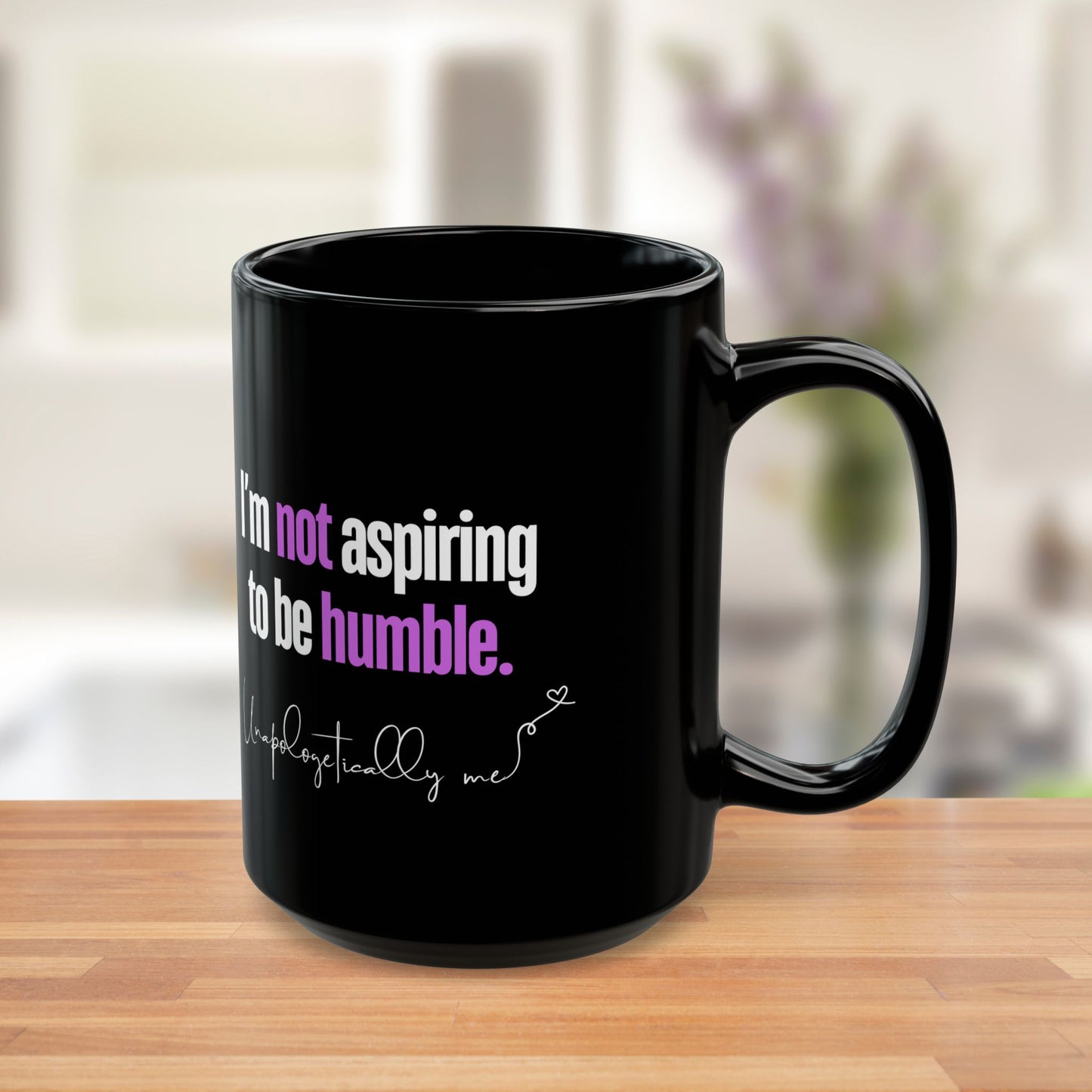 Side view of the mug showing the purple accents on "not" and "humble." 15 oz.