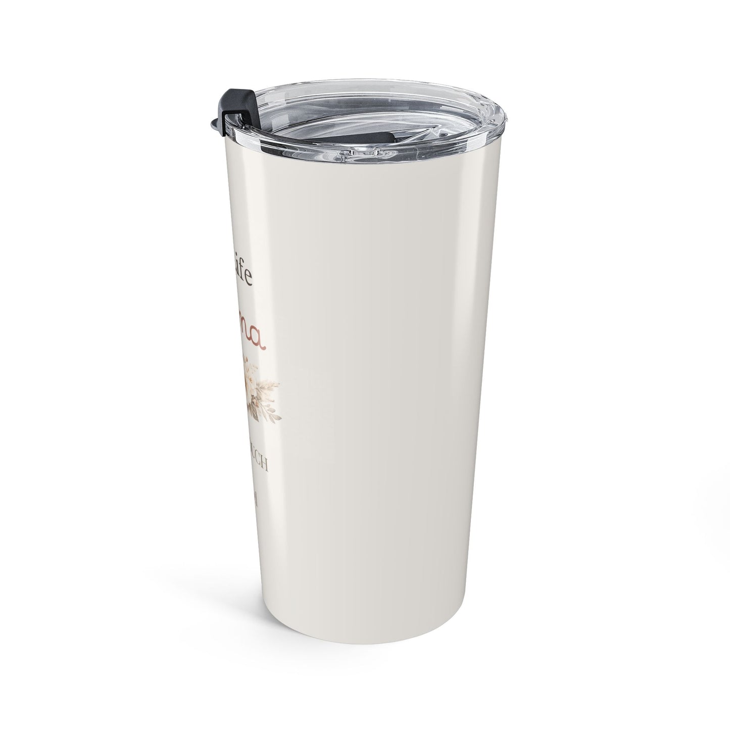 Angled view of white tumbler with text and a design on a white background