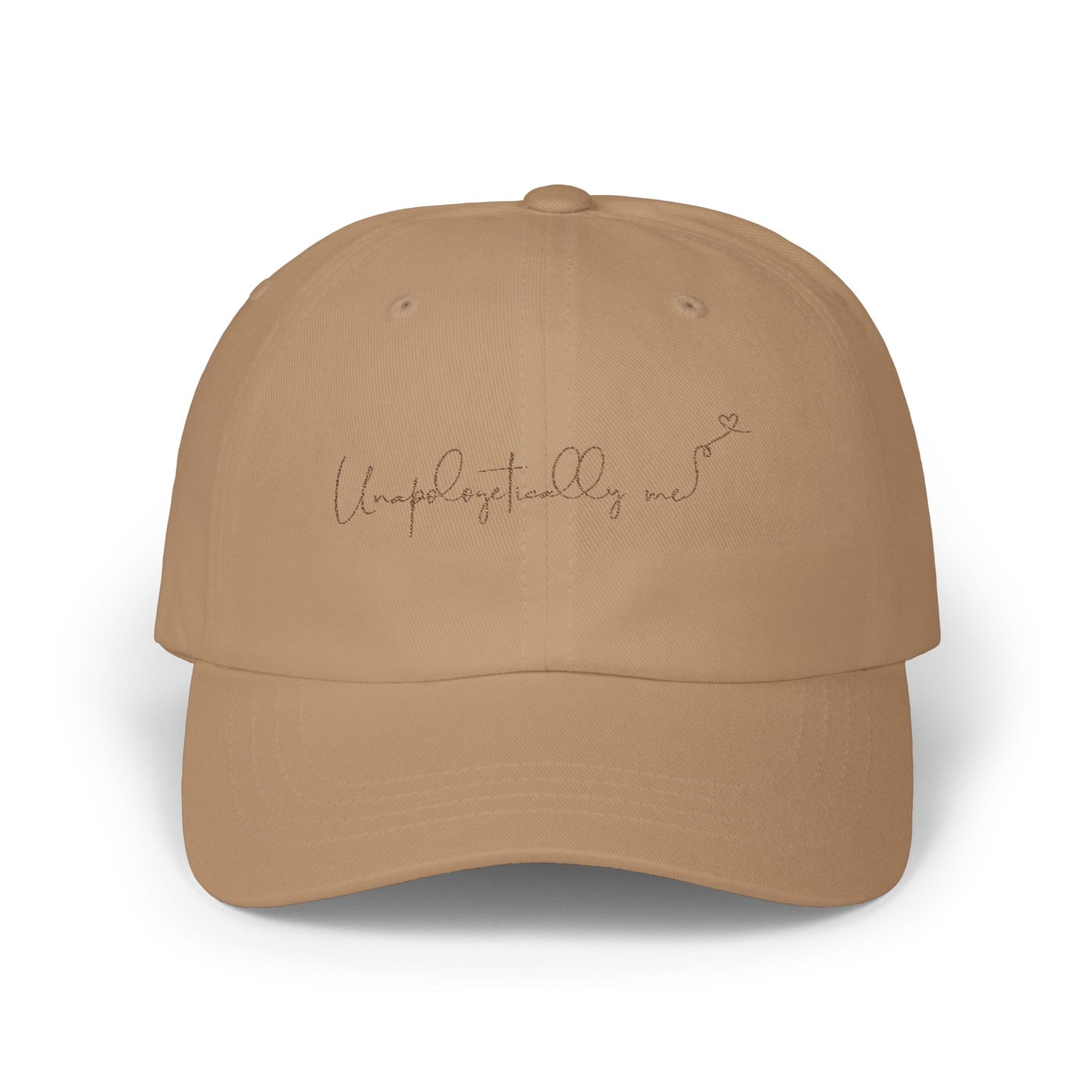 Front view of the 'Unapologetically Me' Classic Dad Hat in khaki, showcasing the embroidered design on a clean, minimalist base.