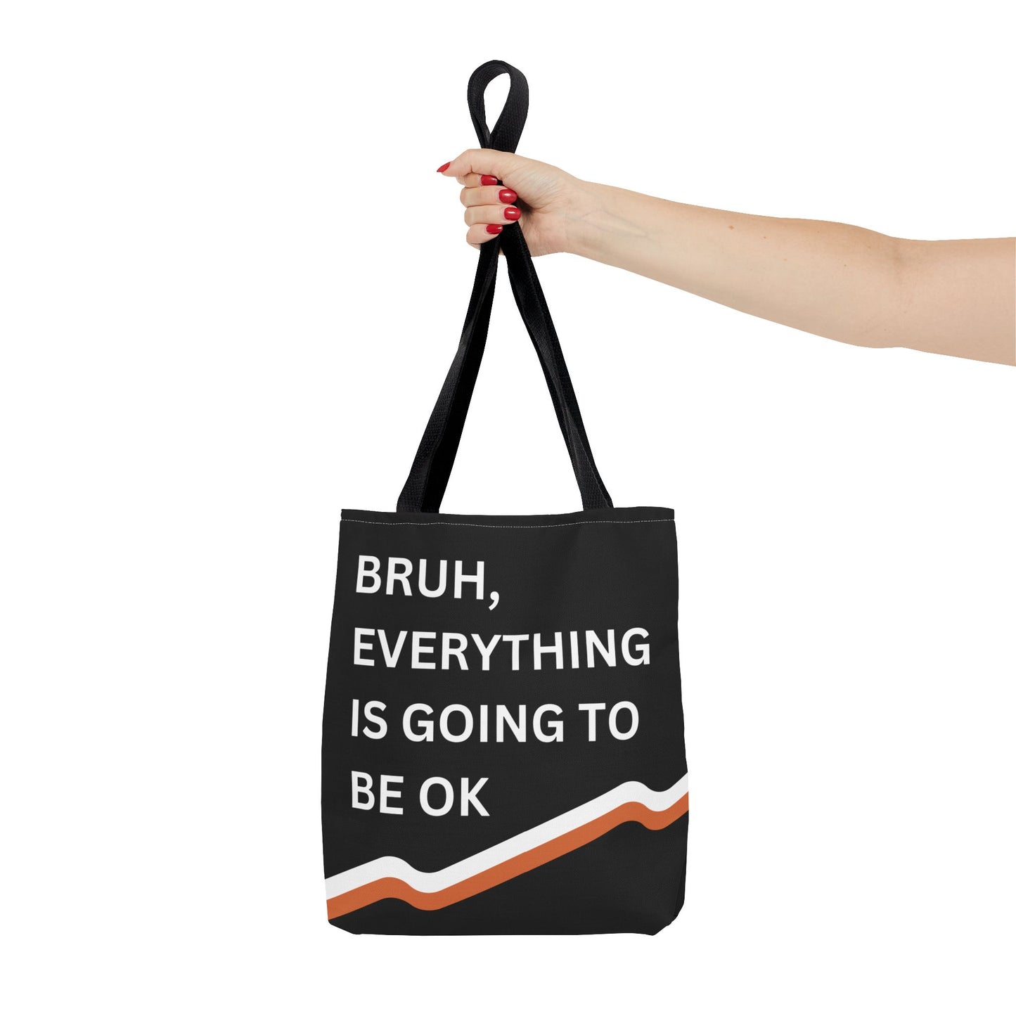 Close-up of a person carrying the motivational tote bag, highlighting the vibrant stripes and positive message.