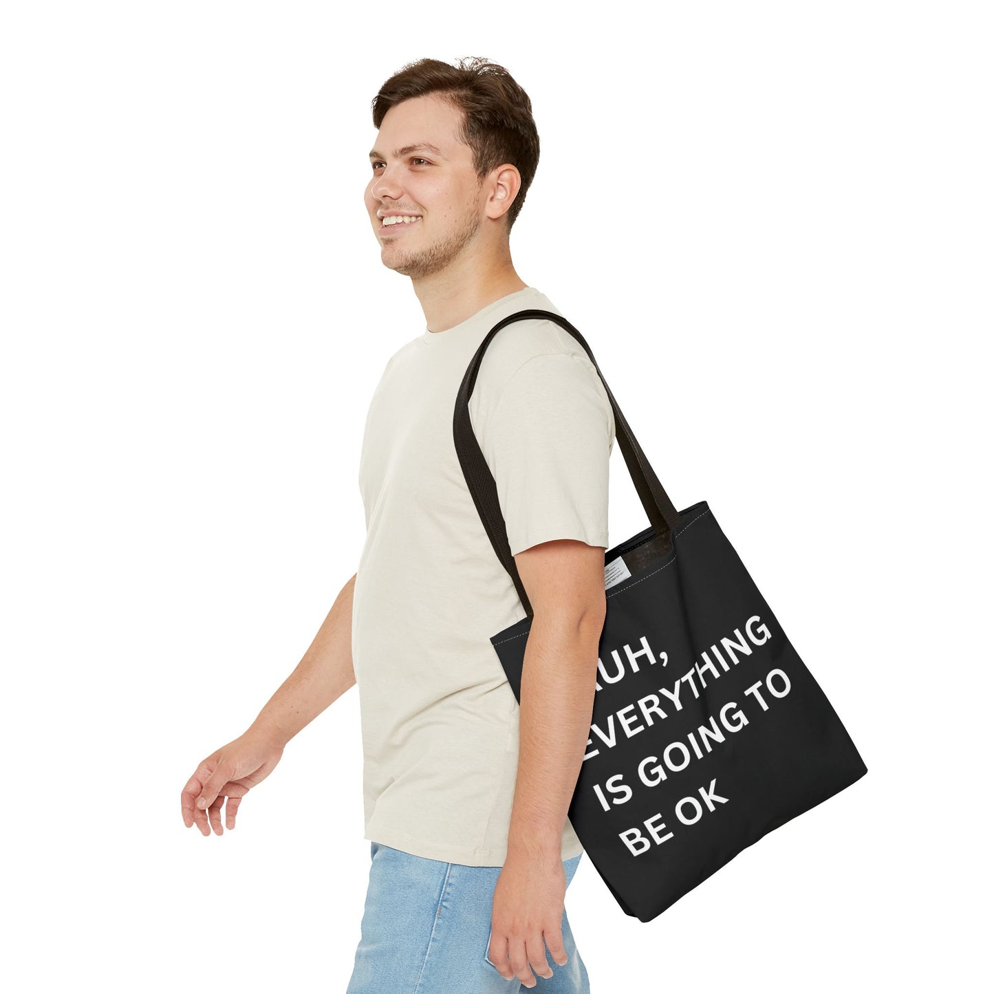 Close-up of a person carrying the minimalist tote bag, highlighting the motivational message in a clean and simple style.