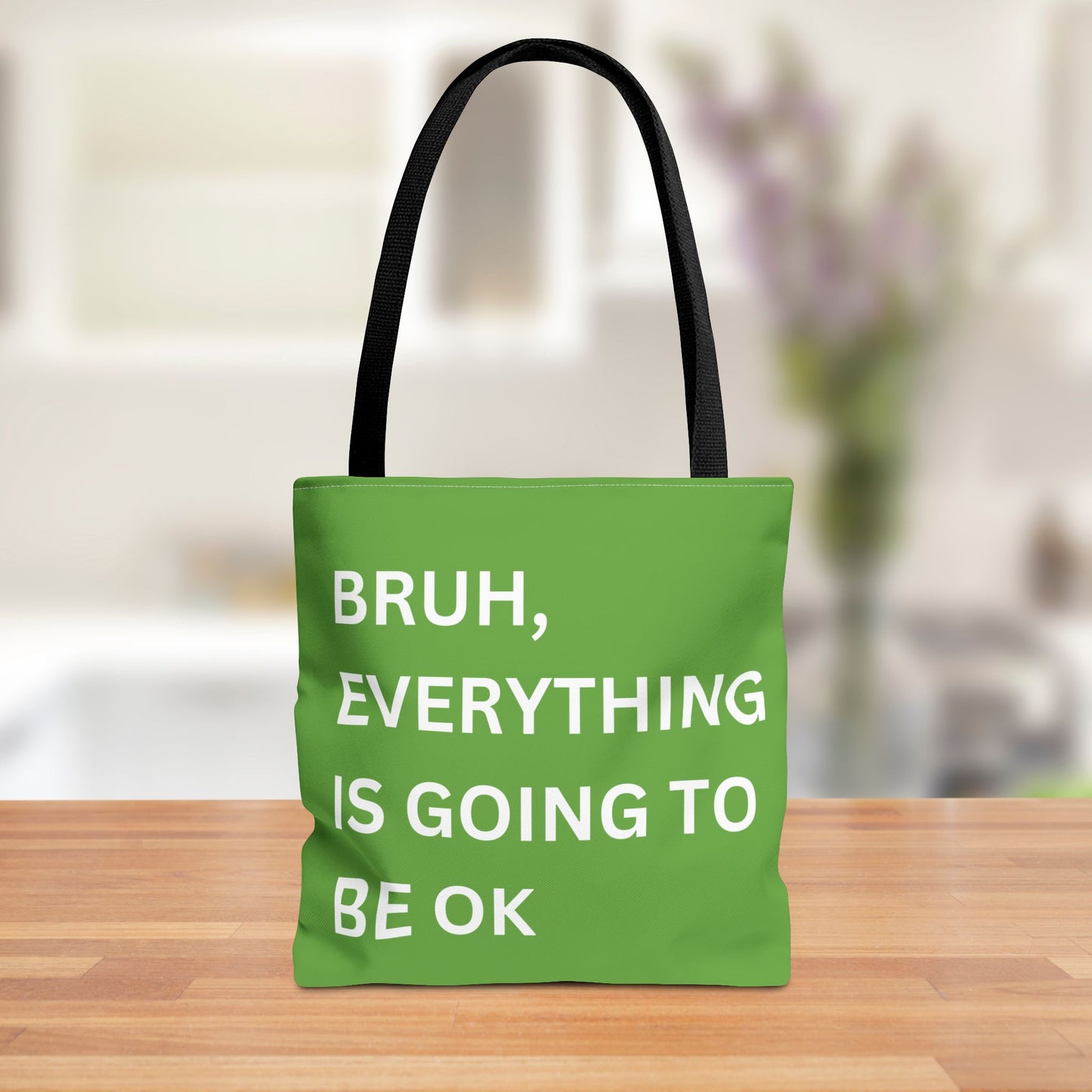 Front view of a minimalist tote bag featuring the quote "Bruh, Everything is Going to Be OK" in simple white text on a brown background.