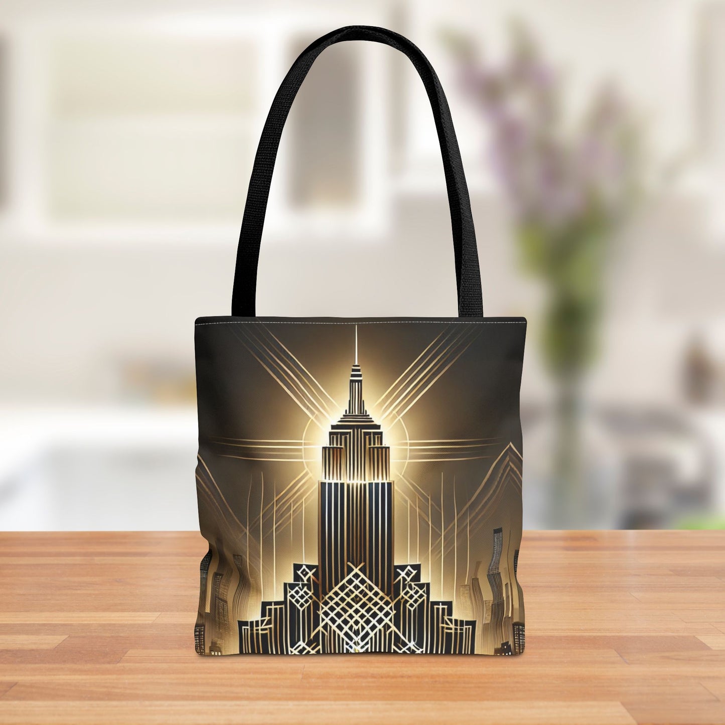 Art Deco-inspired tote bag featuring a golden city skyline design with intricate geometric details, displayed on a wooden table in a modern kitchen setting.