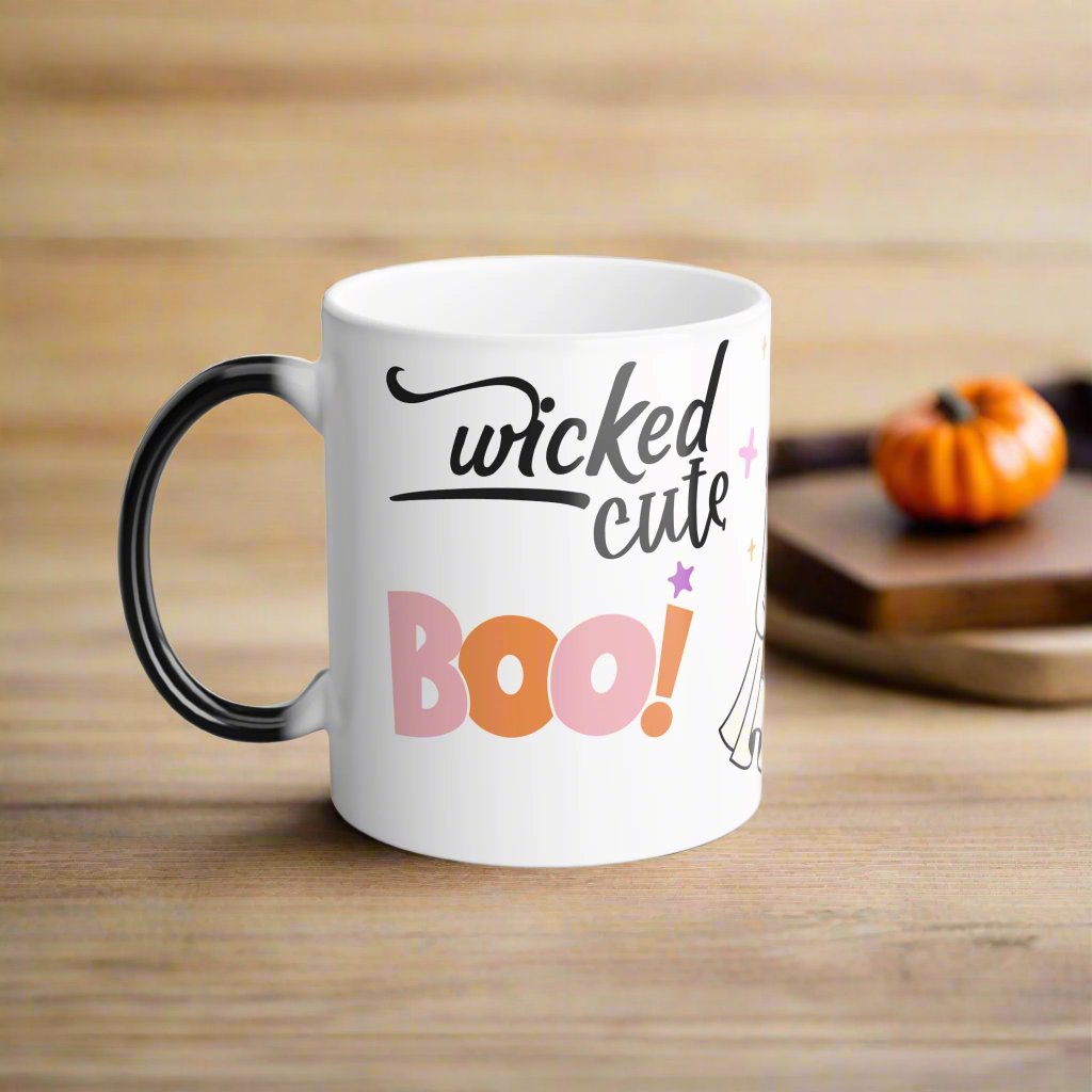 Left side view of Wicked Cute Halloween Boo Magic Morphing Mug showing the same ghost and pumpkin design on a white background.