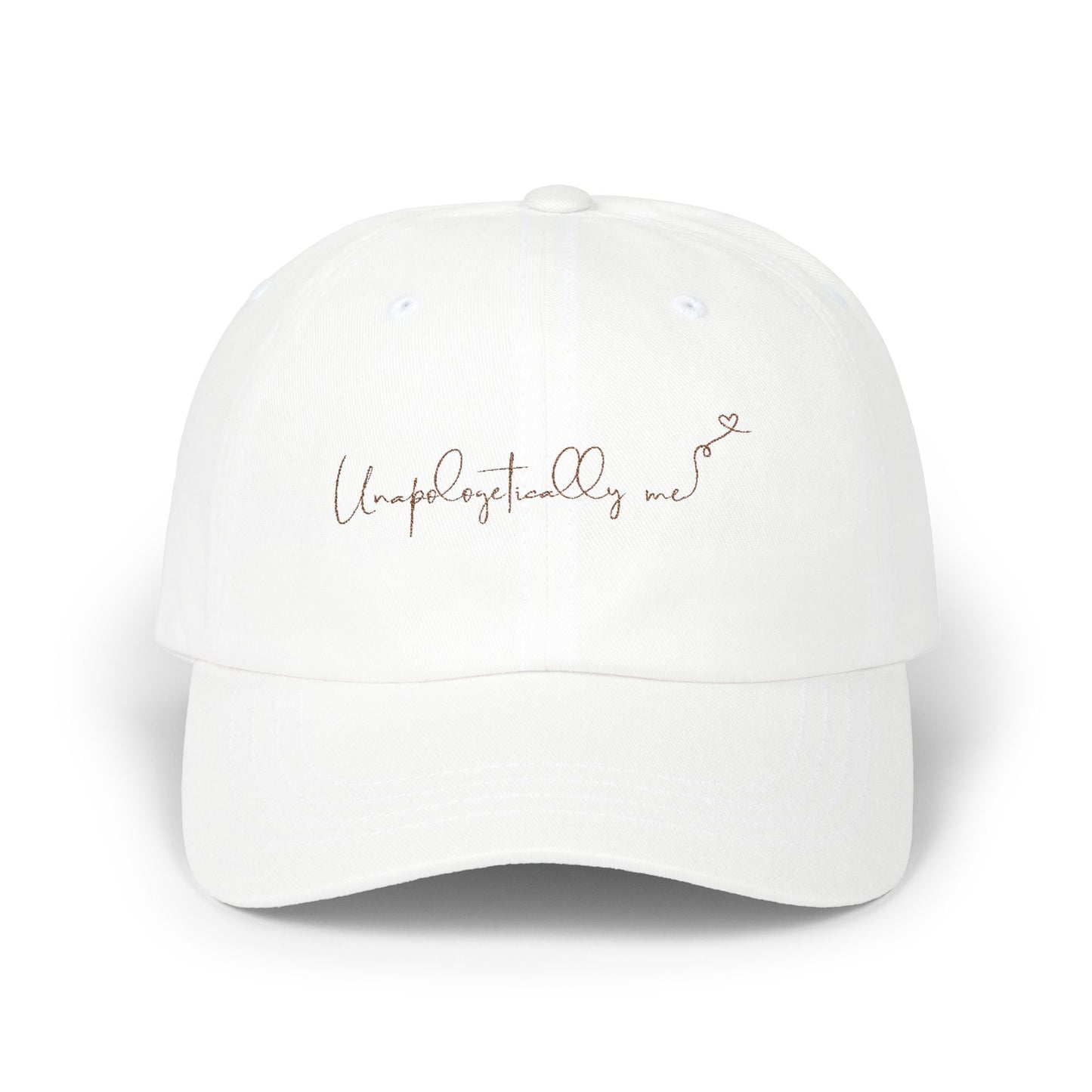 Front view of the 'Unapologetically Me' Classic Dad Hat in white, showcasing the embroidered design on a clean, minimalist base.