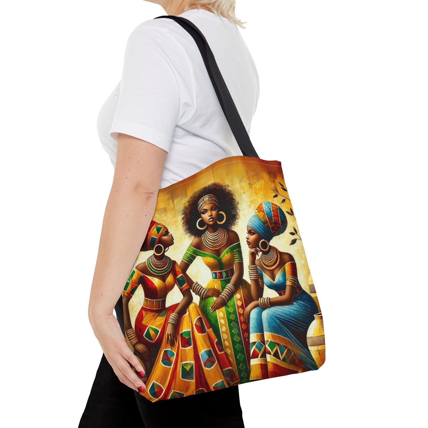 Lifestyle shot of the African Queens Tote Bag displayed on a wooden surface, highlighting its cultural beauty and functionality.