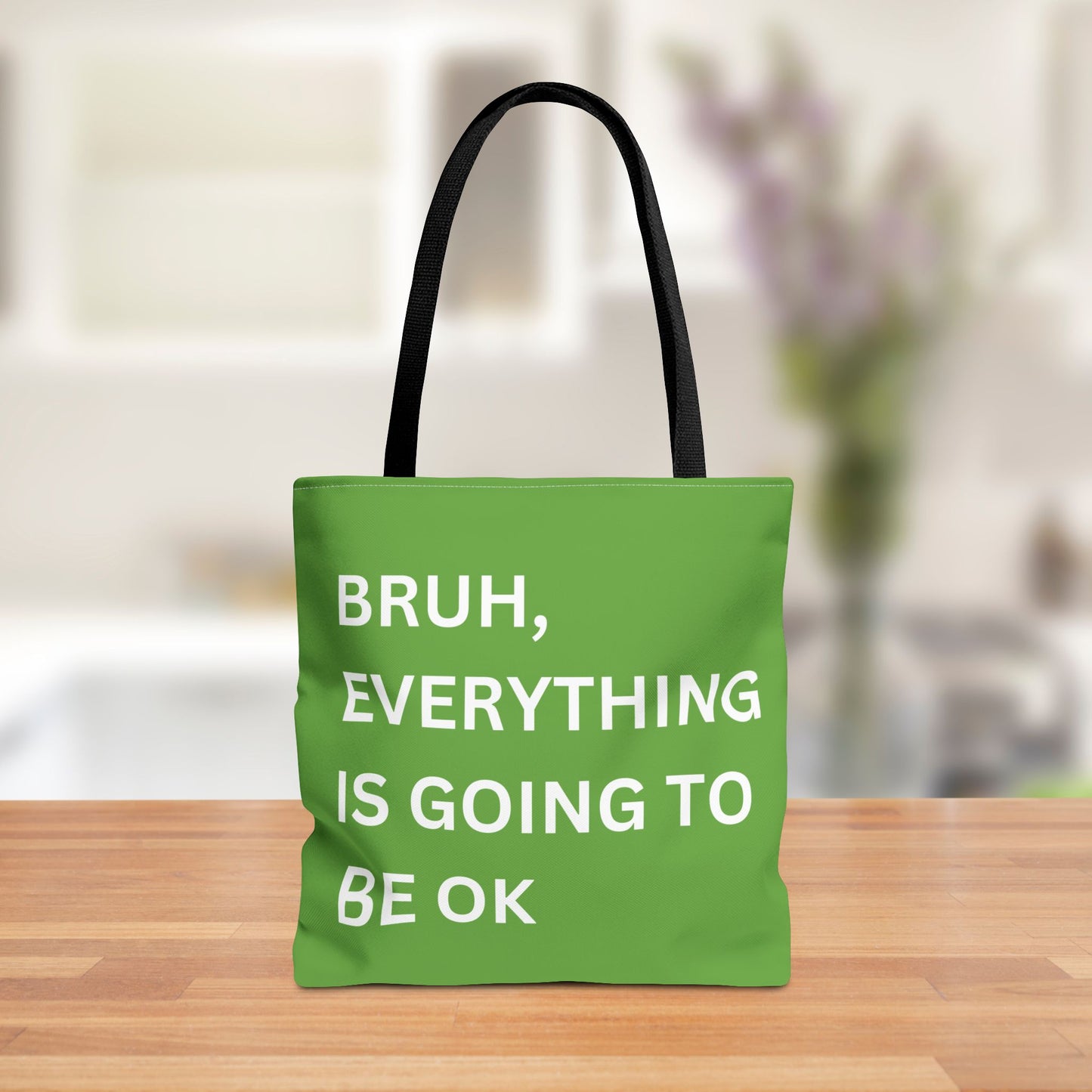 Front view of a minimalist tote bag featuring the quote "Bruh, Everything is Going to Be OK" in simple white text on a brown background.
