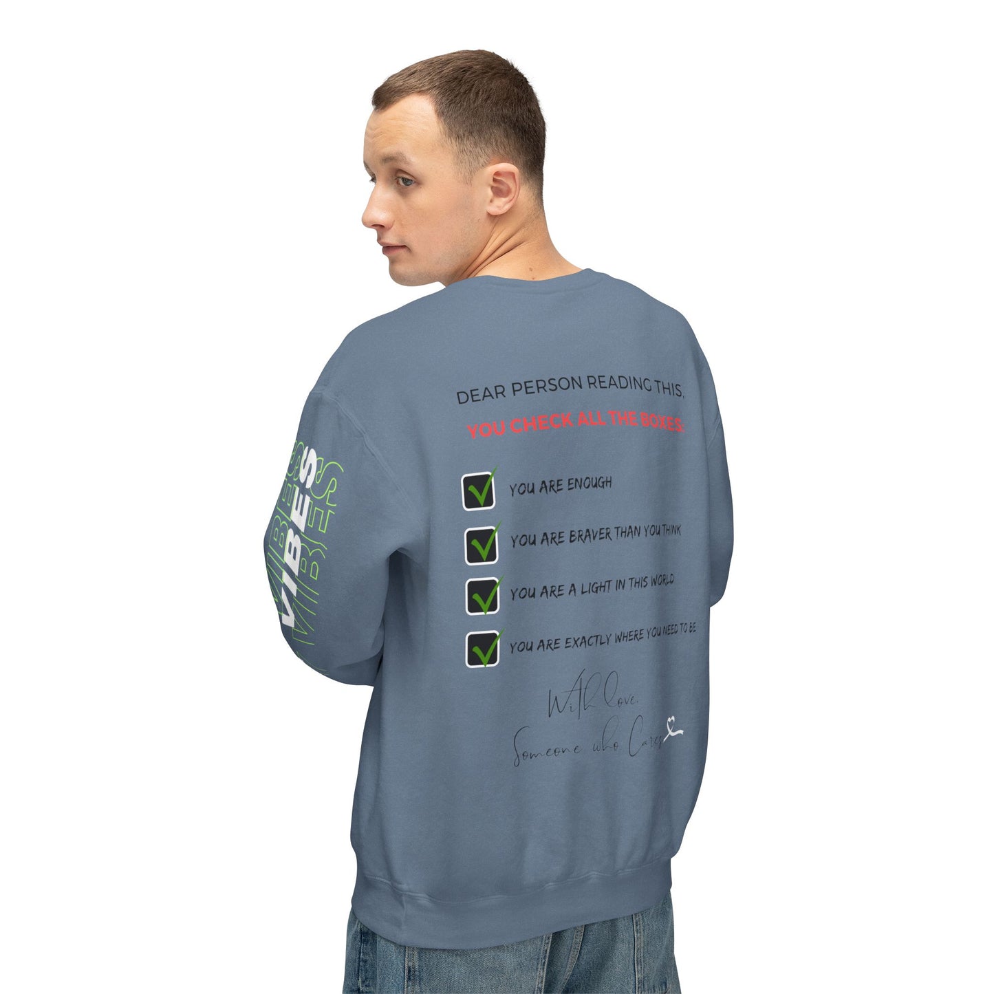 Male model showing the back of the sweatshirt featuring positive affirmations in checklist format.