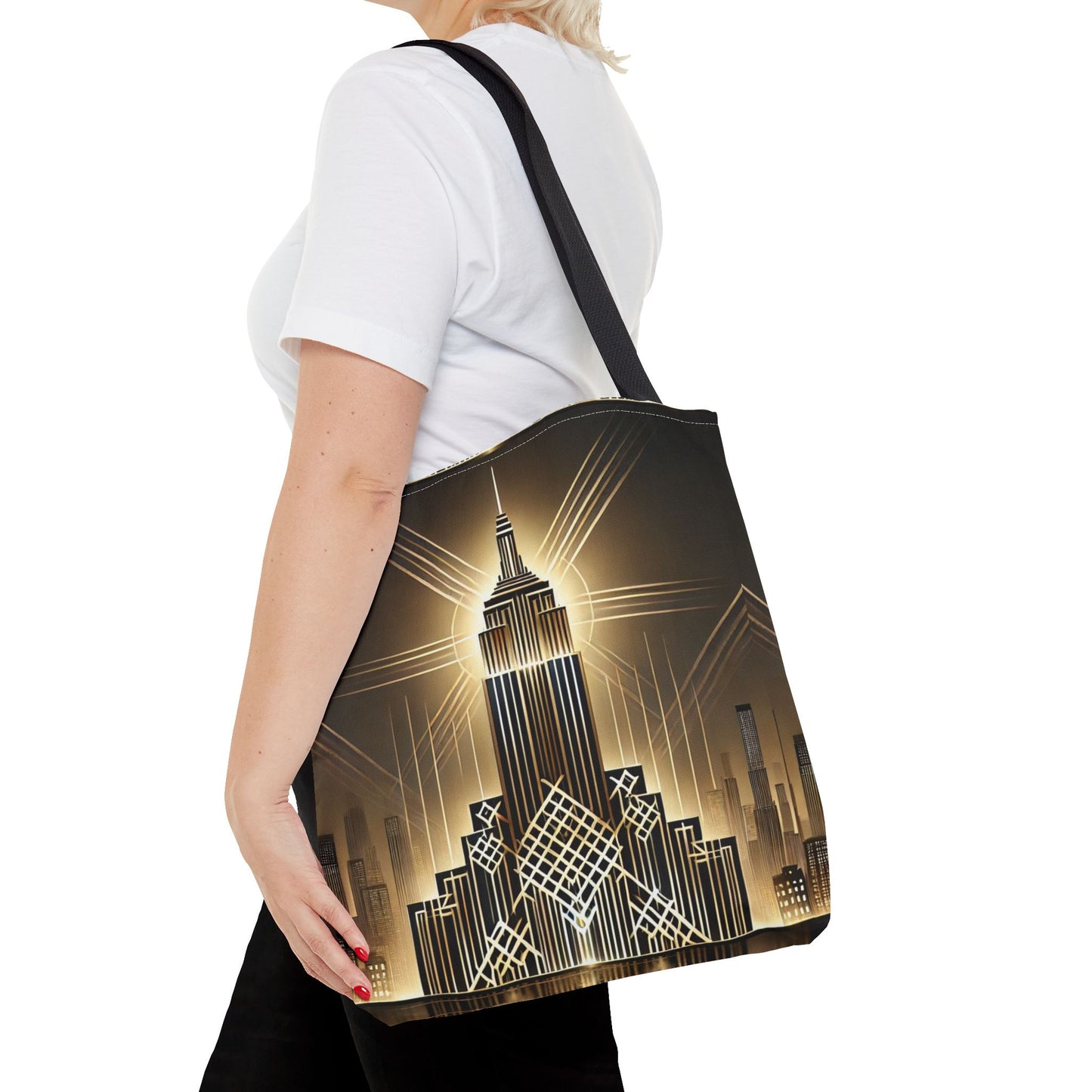 Stylish tote bag with a golden Art Deco skyline design being carried outdoors by a fashionable person, showcasing its versatile and chic aesthetic.