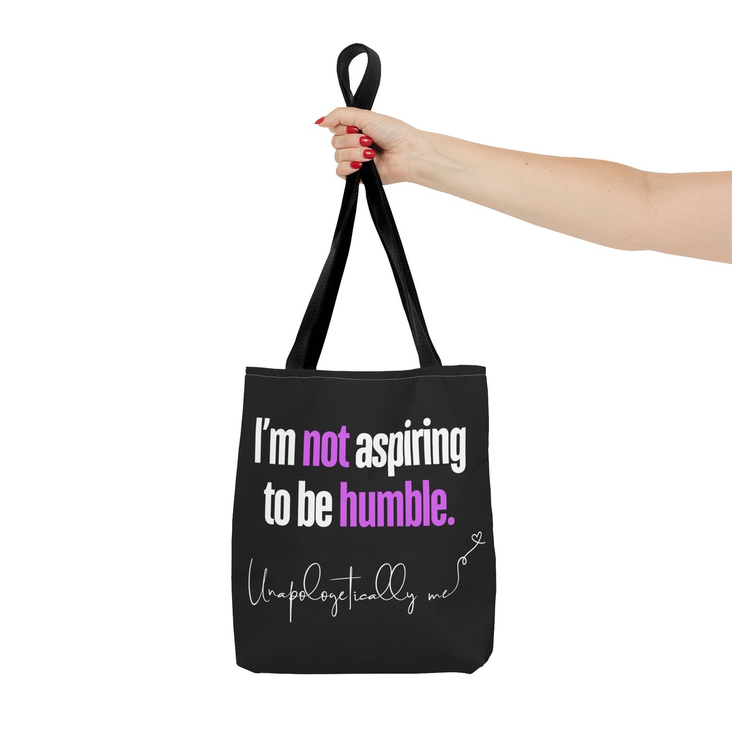 Close-up of the tote bag design highlighting the purple accents on "not" and "humble."