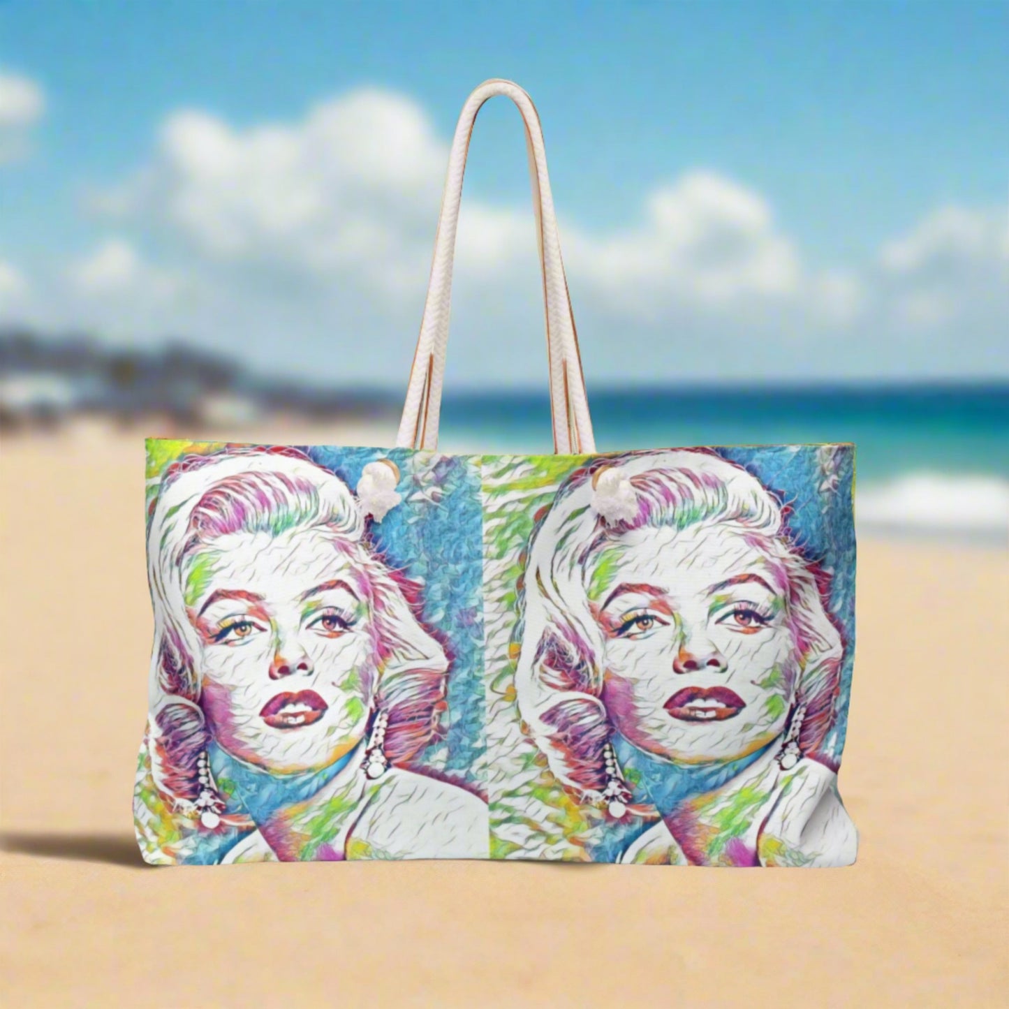 Front view of the Vibrant Marilyn Monroe Signature Weekender Tote Bag showcasing a bold, colorful pop art design of Marilyn Monroe with her signature.