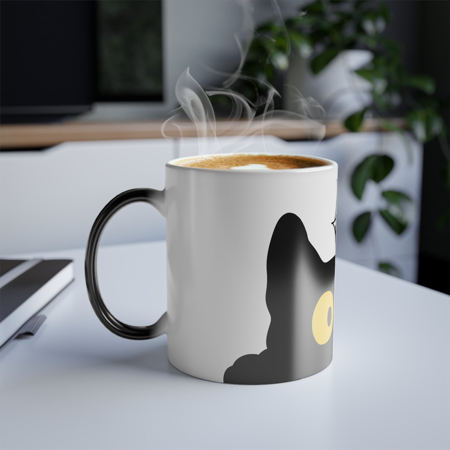 Magic morphing Halloween mug with black cat design on an white background, 11oz coffee cup