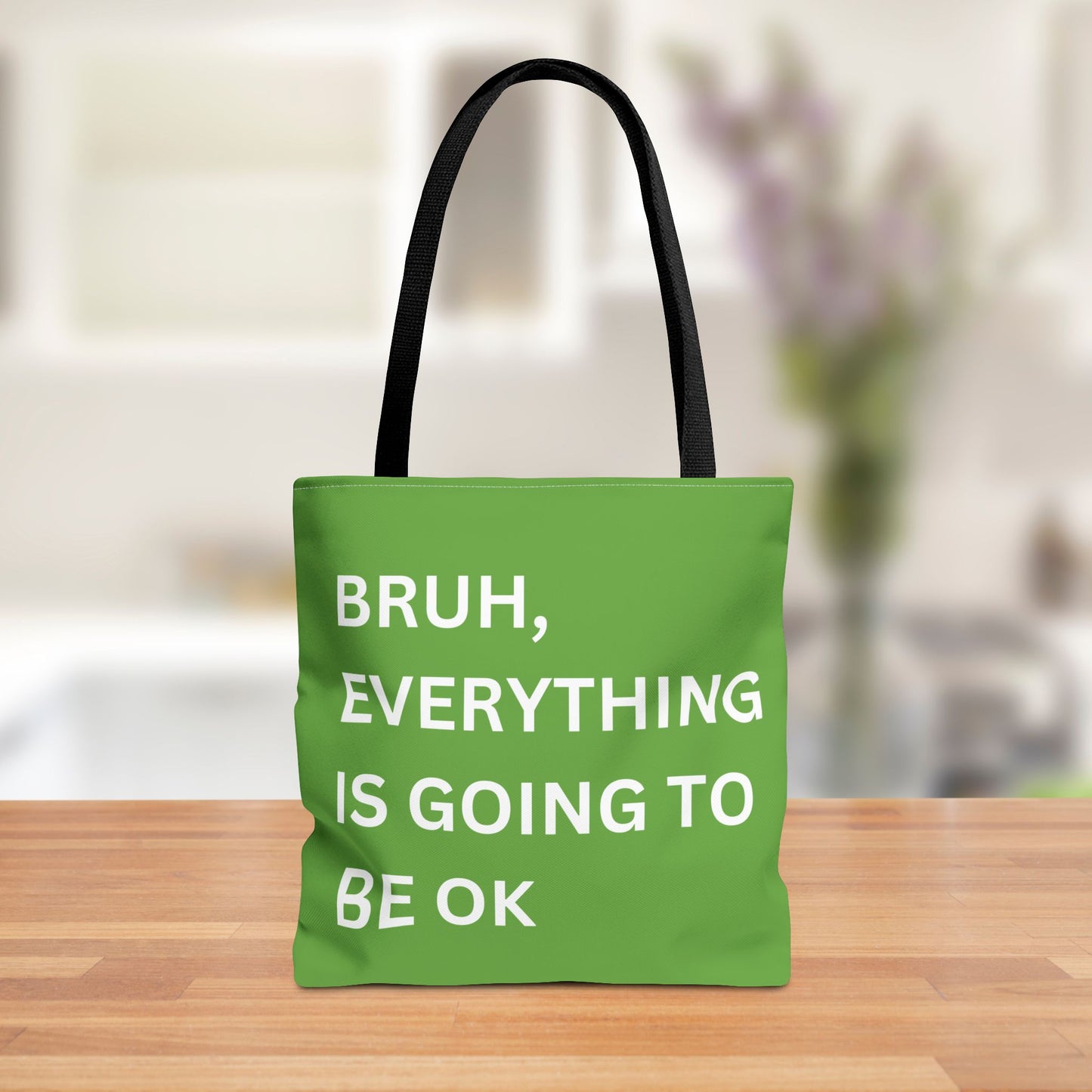 Front view of a minimalist tote bag featuring the quote "Bruh, Everything is Going to Be OK" in simple white text on a brown background.