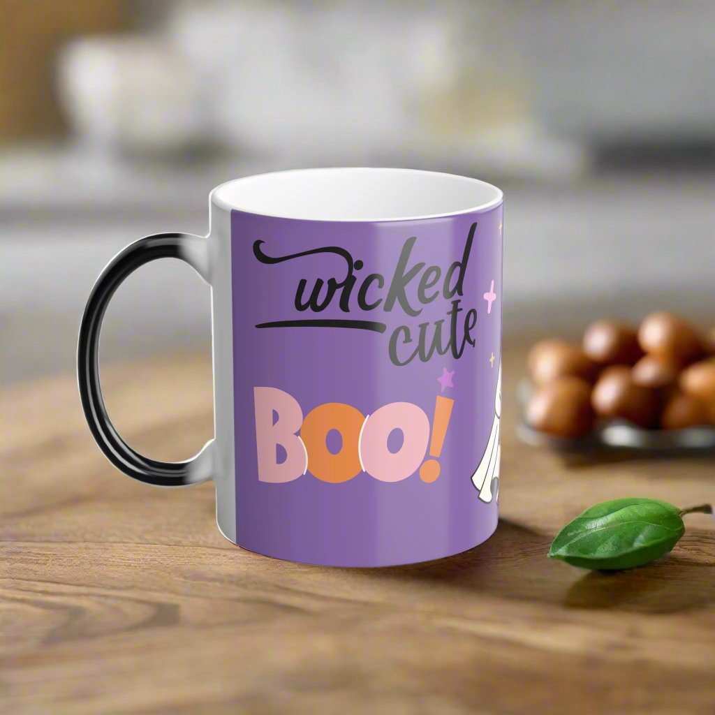 Right side view of Wicked Cute Halloween Boo Magic Morphing Mug highlighting the continuation of the ghost and pumpkin artwork on the purple background.