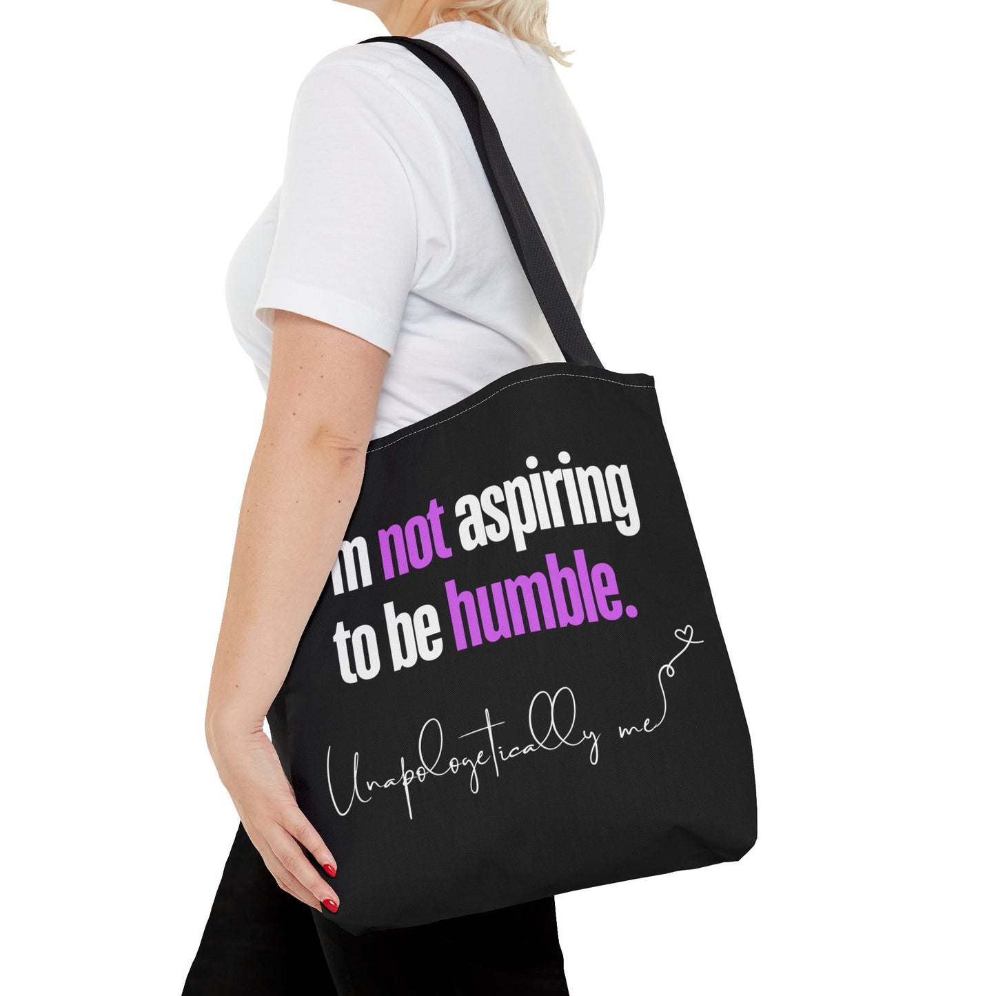 Lifestyle image of the tote bag being carried by a model in a casual setting.