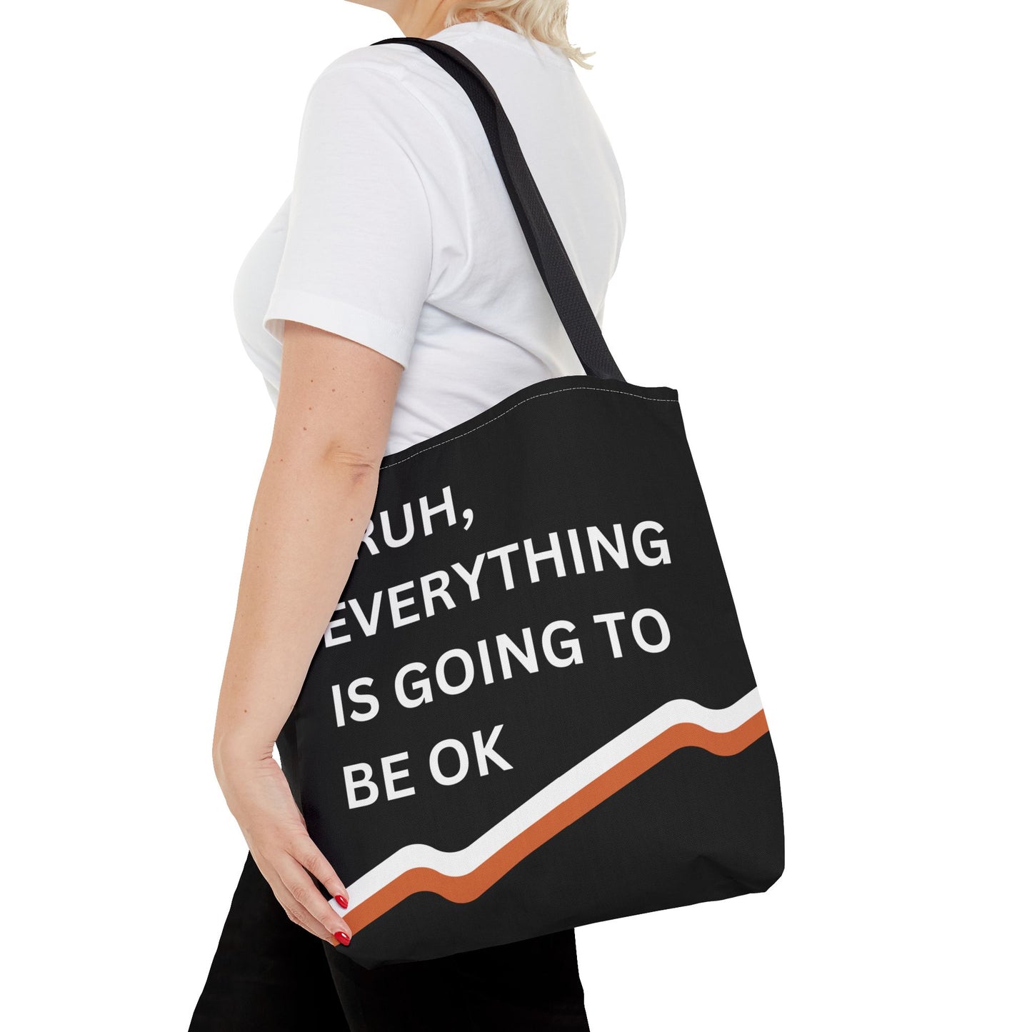 Close-up of a person carrying the motivational tote bag, highlighting the vibrant stripes and positive message.