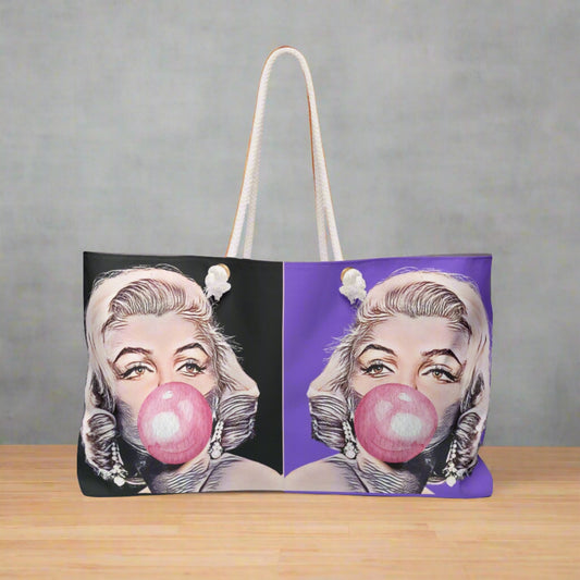 Front view of the Bubble Gum Marilyn Monroe Weekender Tote Bag showing dual-toned pop art design.