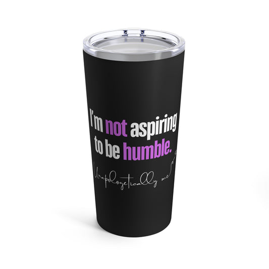 Front view of a black stainless steel tumbler with the phrase “I’m not aspiring to be humble.”