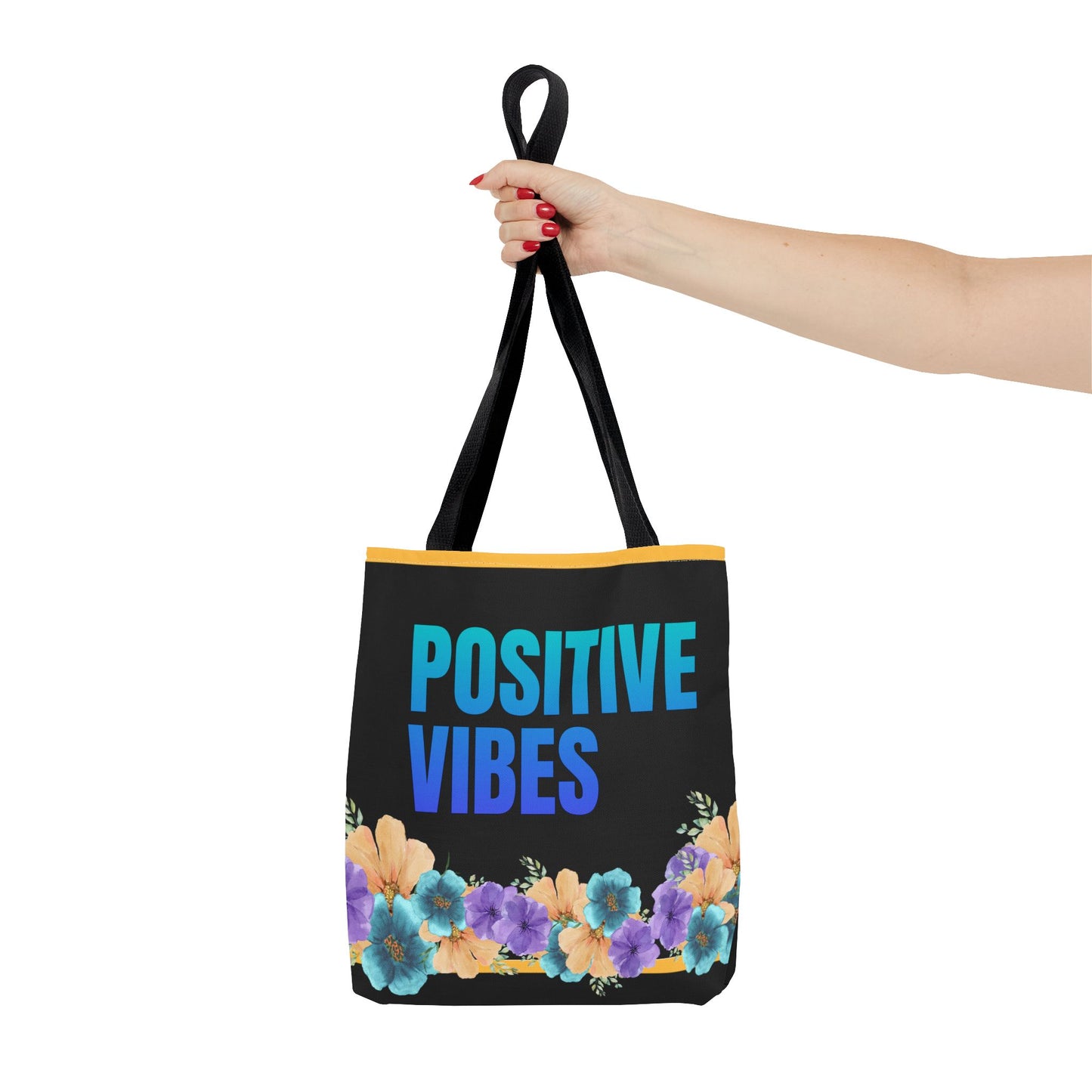 Positive Vibes Tote Bag showcasing gradient blue text and vibrant floral design.