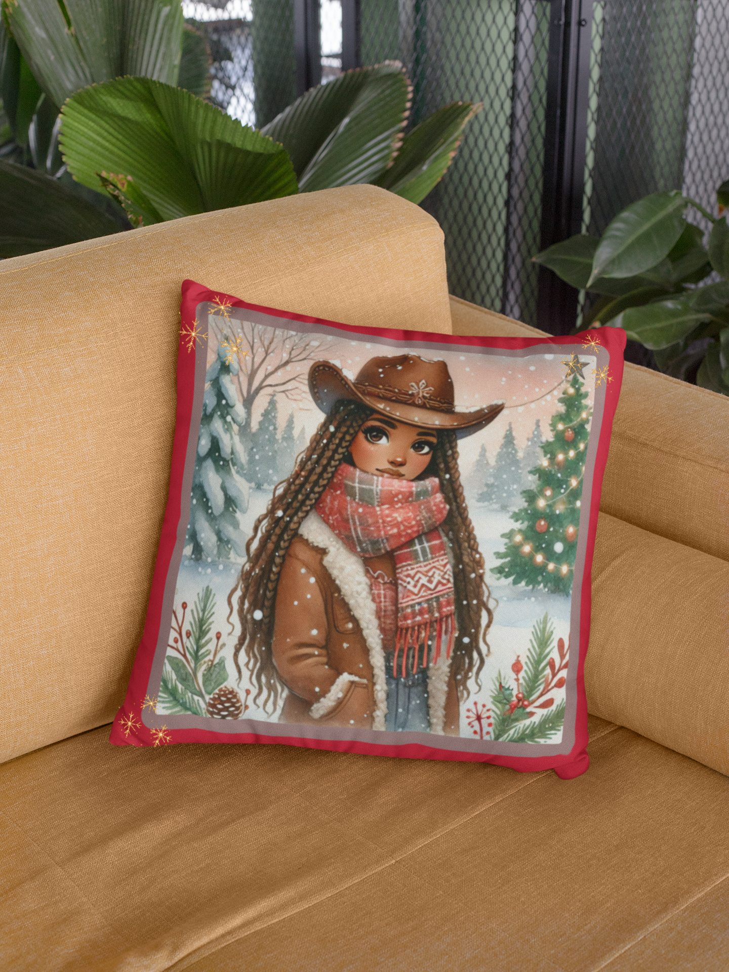 Decorative throw pillow on a cozy couch showcasing a red background with golden snowflakes and a winter cowgirl design.