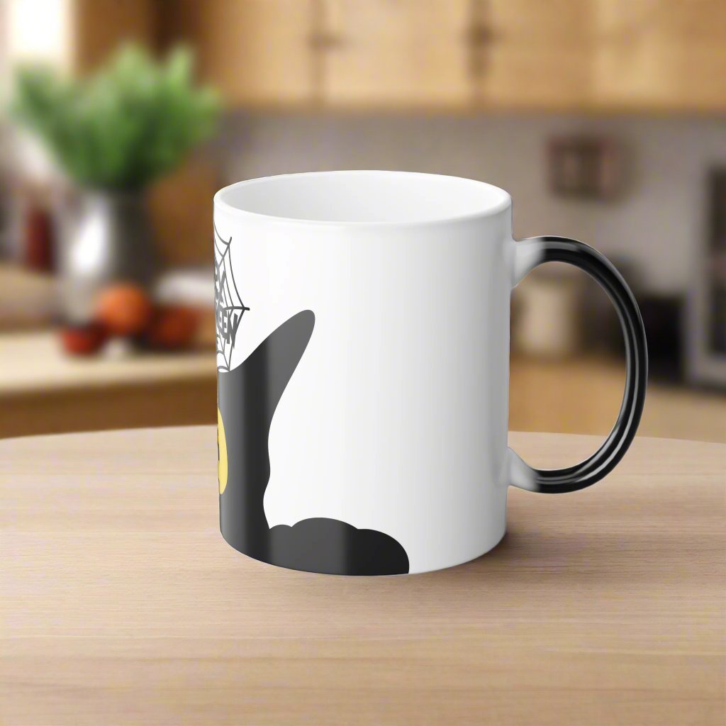 Magic morphing Halloween mug with black cat design on an white background, 11oz coffee cup