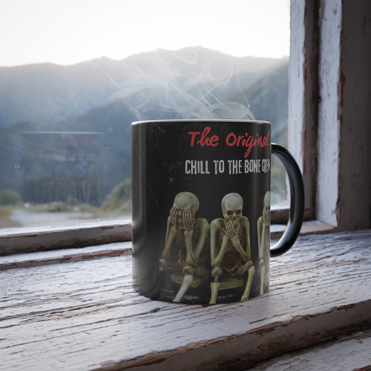 Close-up of skeleton design being revealed on heat-activated magic mug.