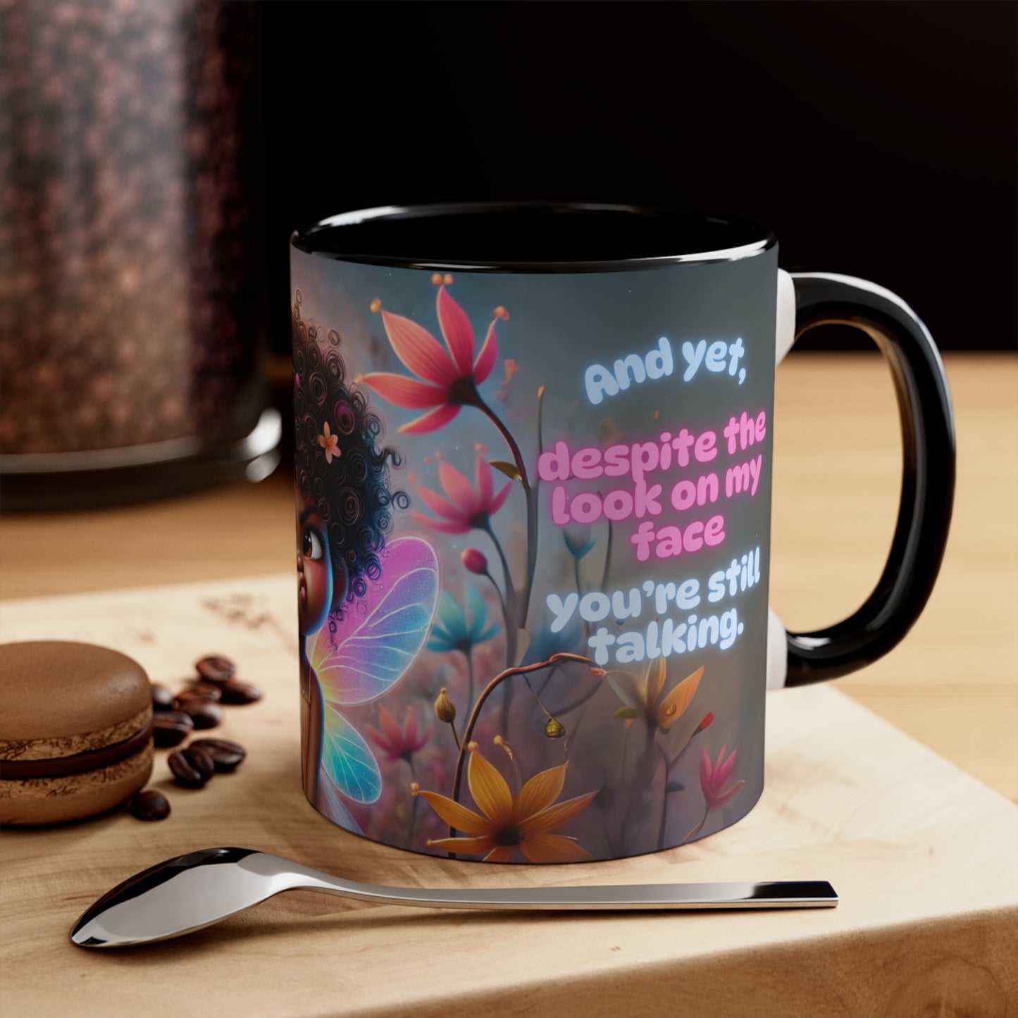 Side view of the coffee mug showing the quote and whimsical floral details