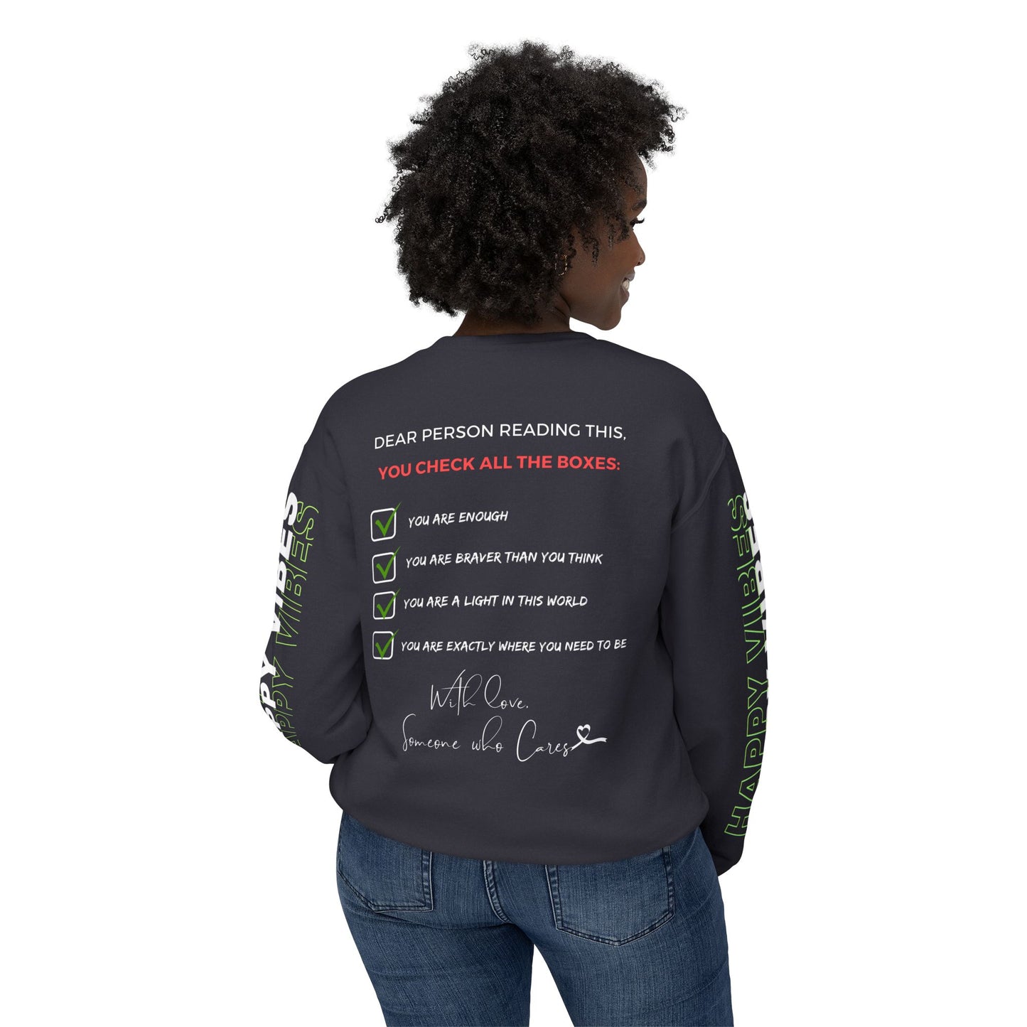 Woman showcasing the back of the Happy Vibes Unisex Sweatshirt with a checklist of positive affirmations.