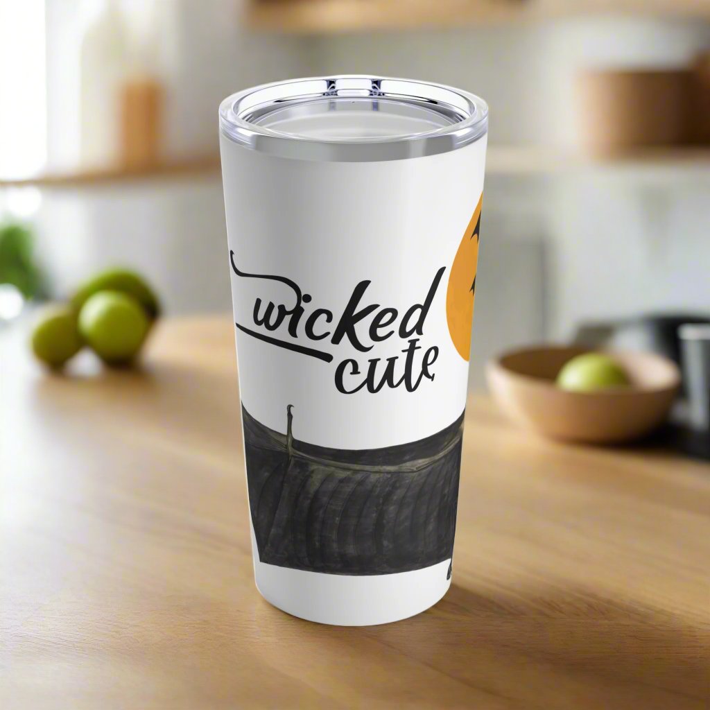 Left side view of the Wicked Cute Bat 20oz Stainless Steel Tumbler, showcasing the bat graphic wrapping around the side.
