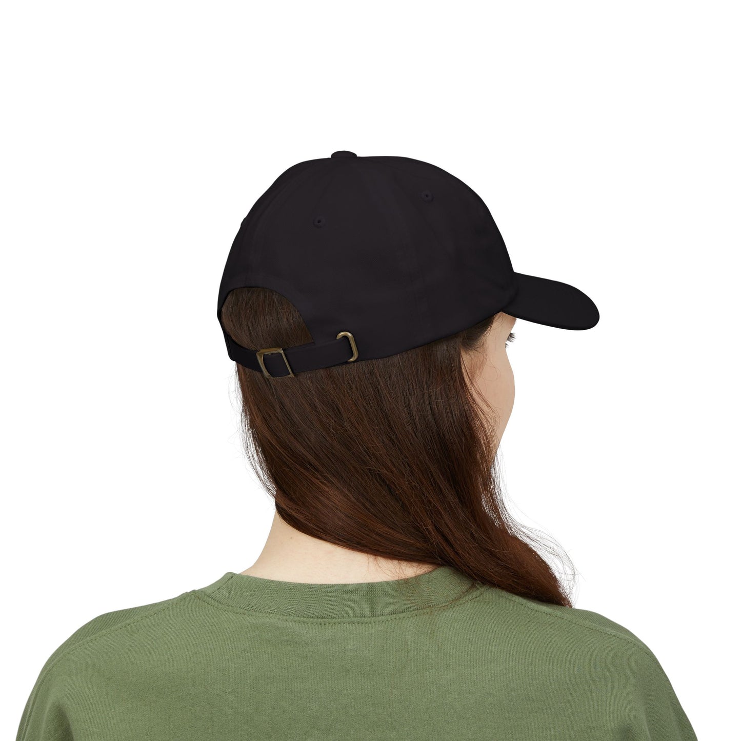 Model wearing the 'Unapologetically Me' Classic Dad Hat in black, facing backward, showing the adjustable strap with antique brass buckle