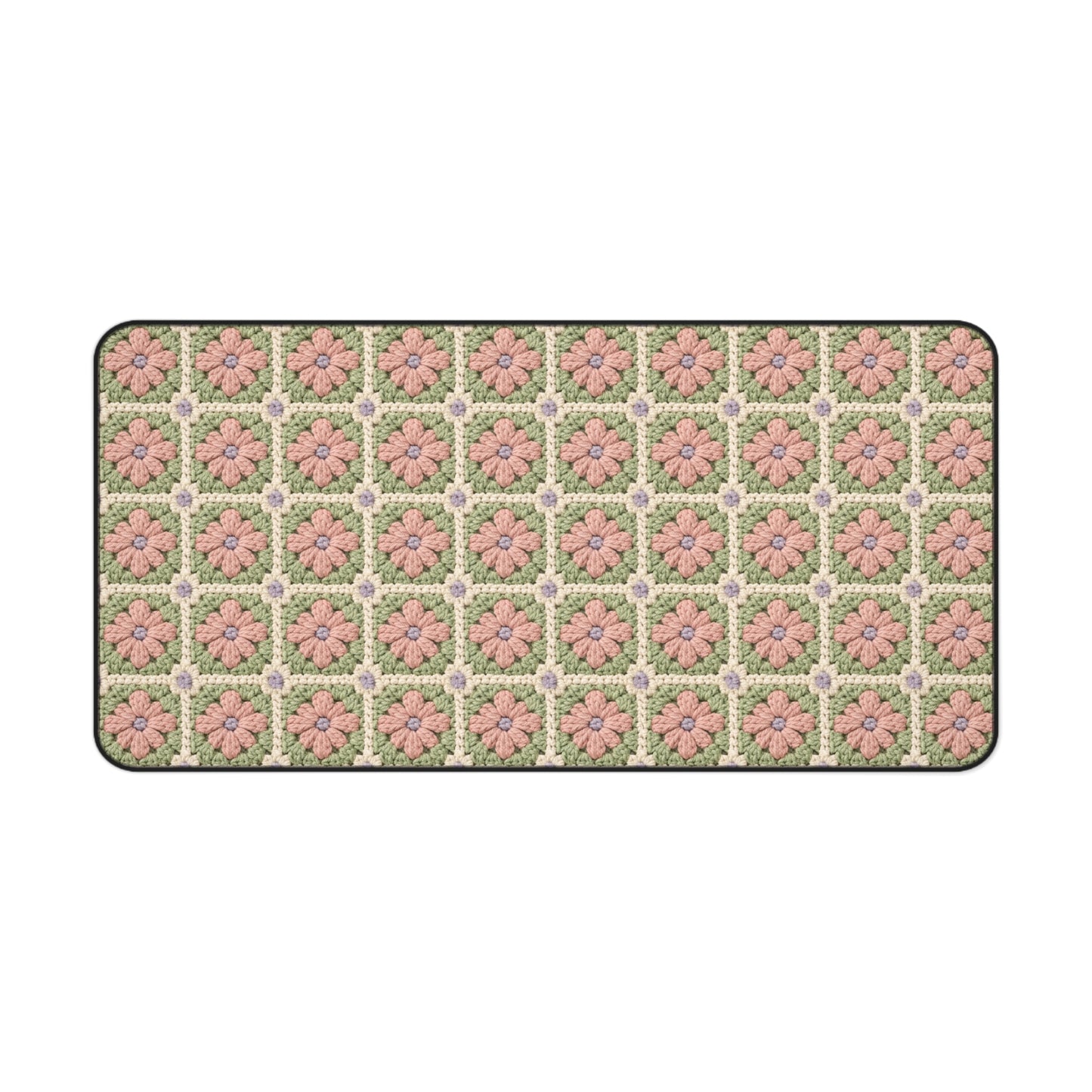 Floral patterned rug with pink flowers on a green background