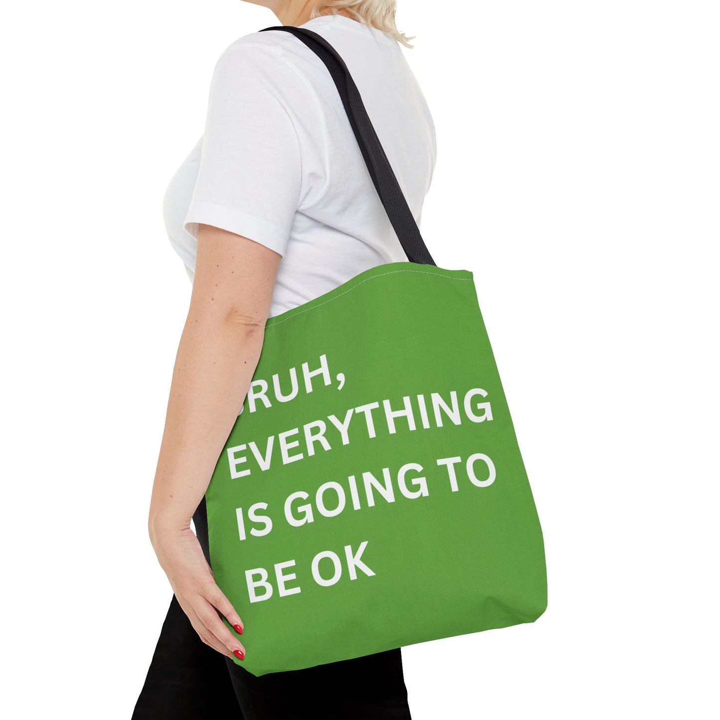 Close-up of a person carrying the minimalist tote bag, highlighting the motivational message in a clean and simple style.