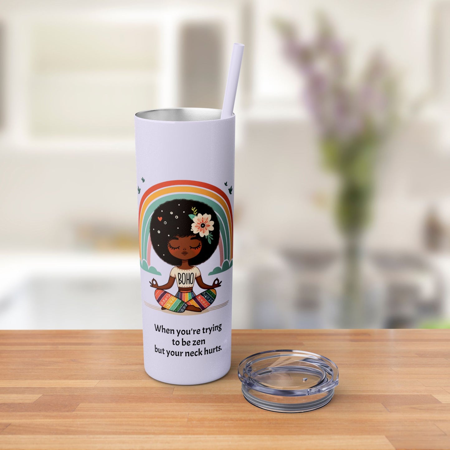 Close-up of the Zen Meditating Tumbler's lid, featuring the included straw for easy sipping.