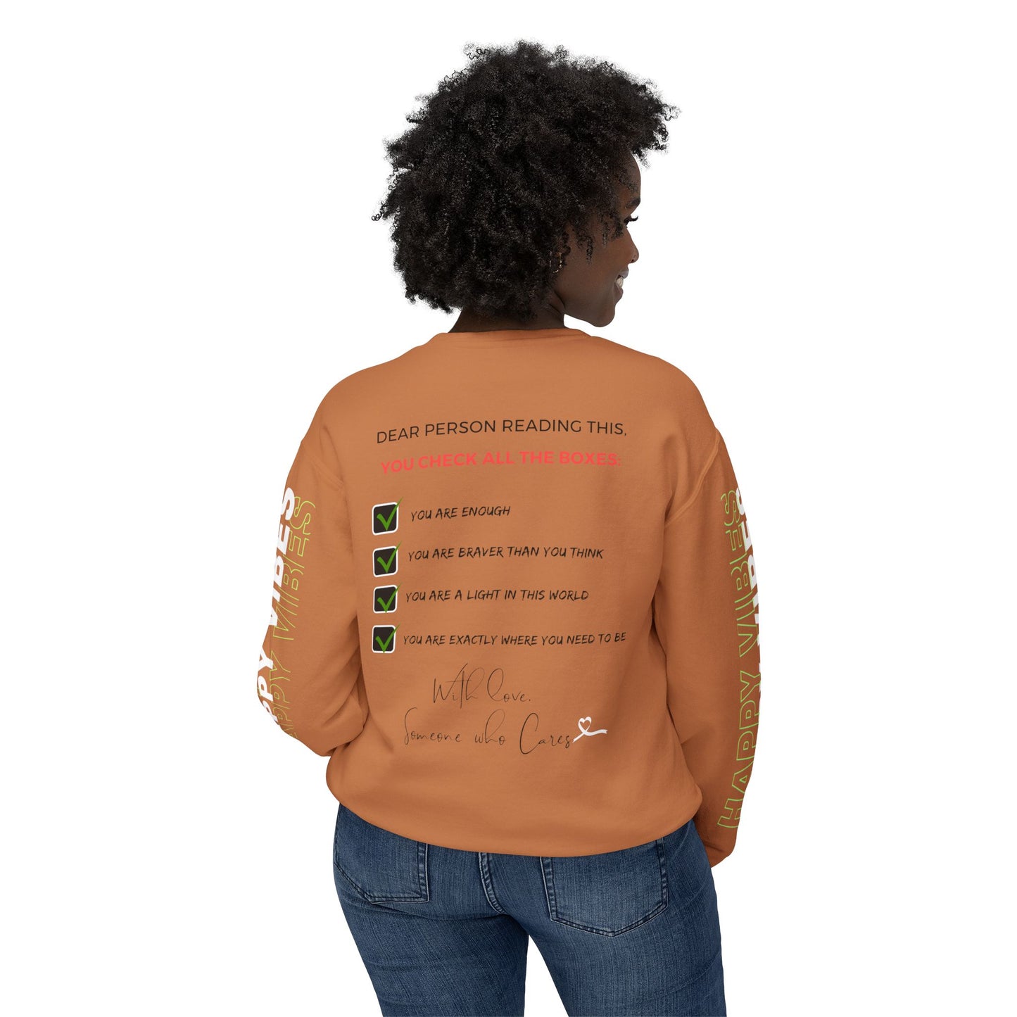 Woman showcasing the back of the Happy Vibes Unisex Sweatshirt with a checklist of positive affirmations. Yam color