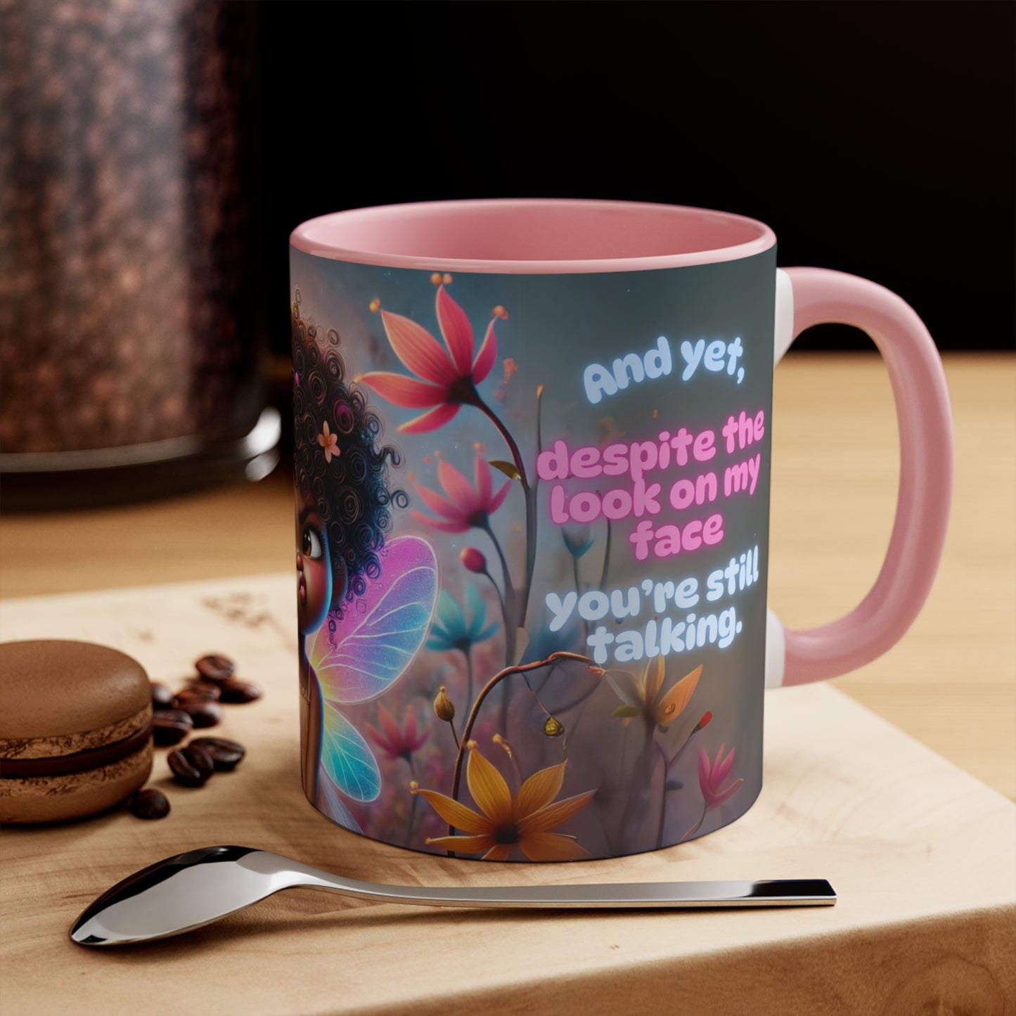 Side view of the coffee mug showing the quote and whimsical floral details