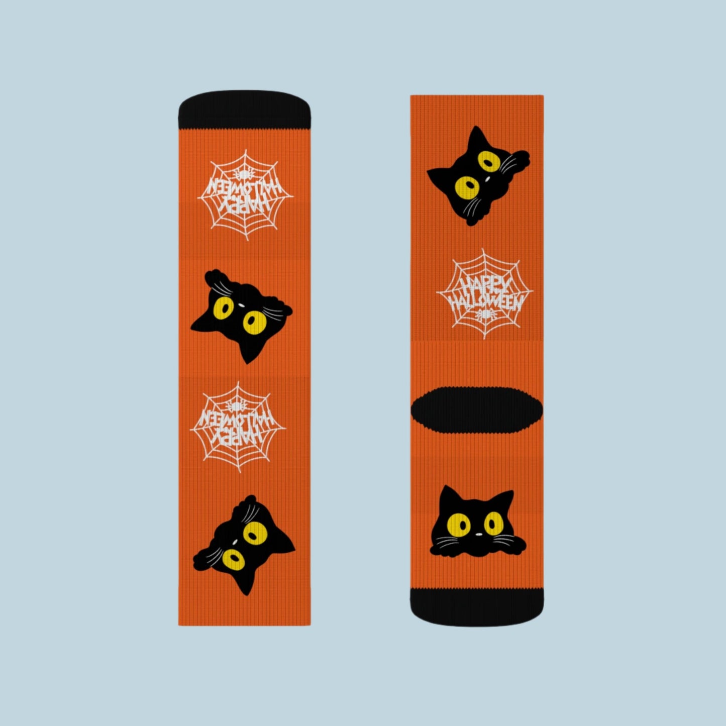 Orange Halloween socks featuring a playful black cat design with spider webs, worn on feet, showcasing a festive and spooky style.