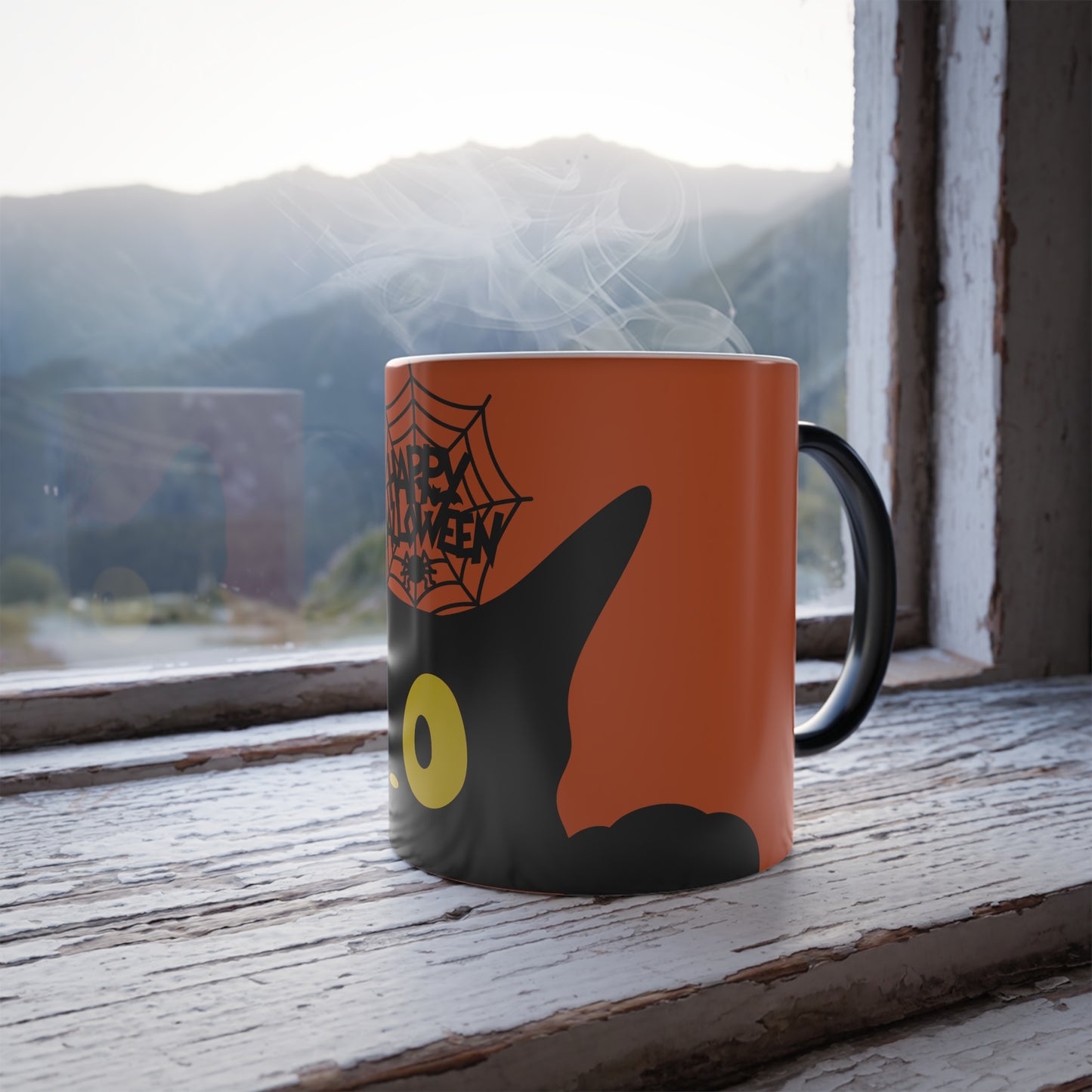 Magic morphing Halloween mug with black cat design on an orange background, 11oz coffee cup