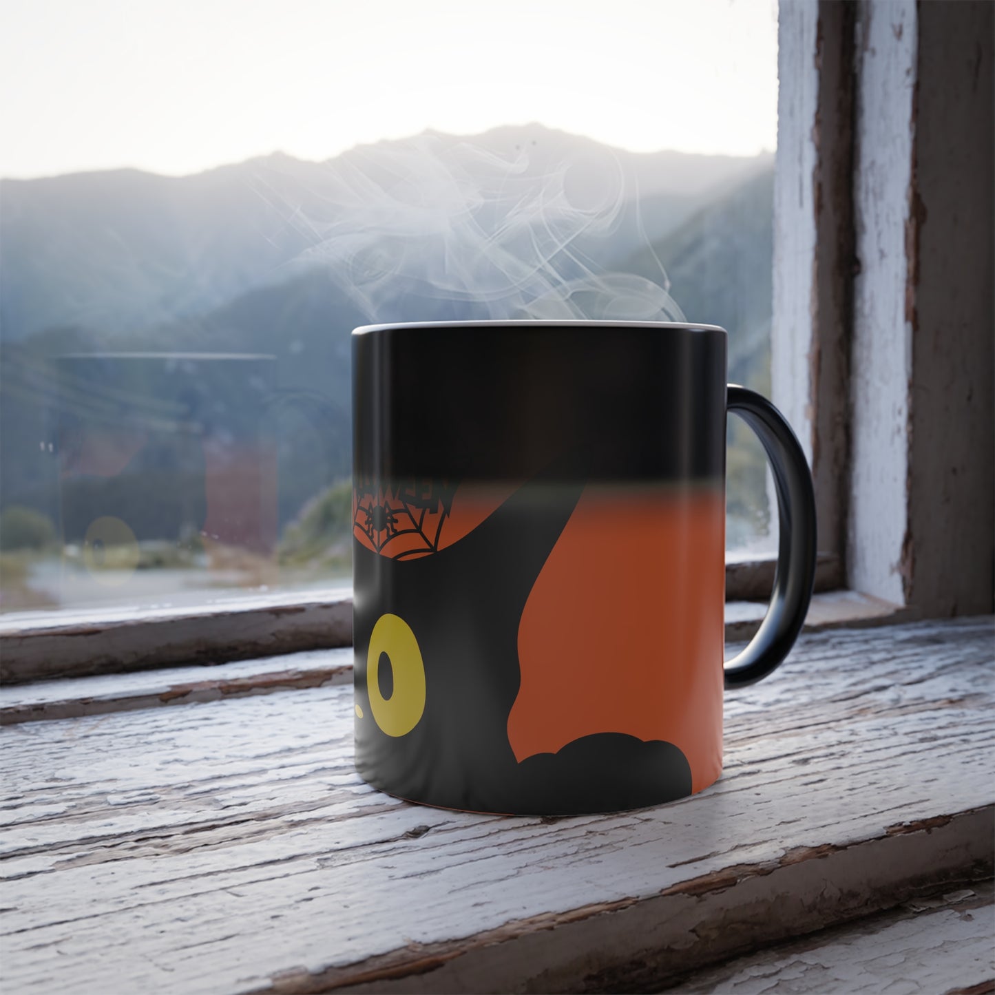 Magic morphing Halloween mug with black cat design on an orange background, 11oz coffee cup