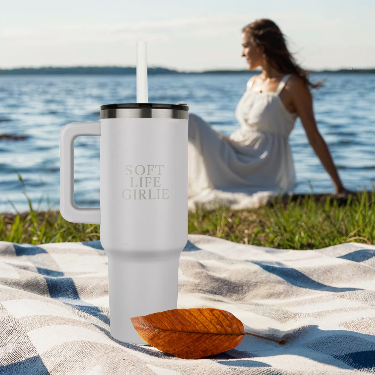 Soft Life Girlie™ tumbler displayed outdoors on picnic blanket