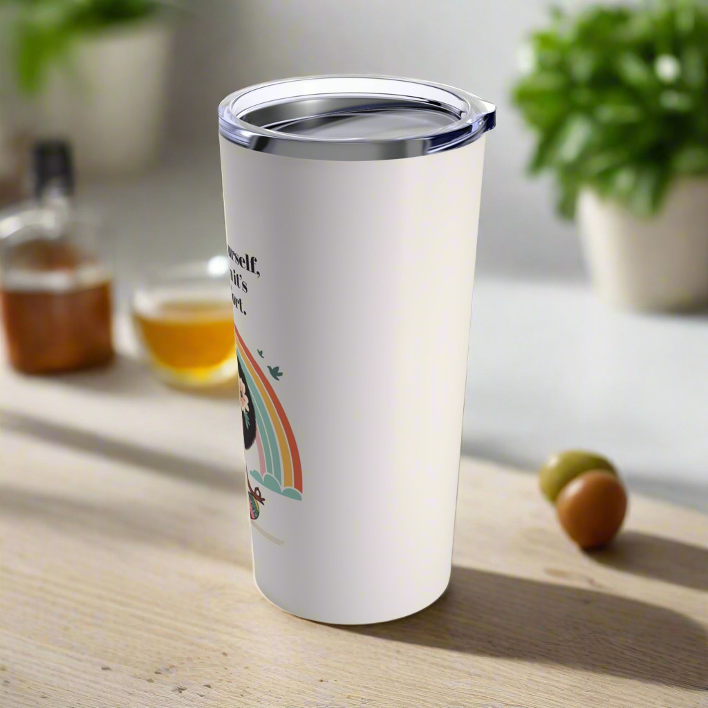 20oz white travel tumbler featuring a zen-inspired design of a meditating woman with an afro, adorned with a rainbow and the phrase 'Espresso yourself, even when it's a latte effort.'
