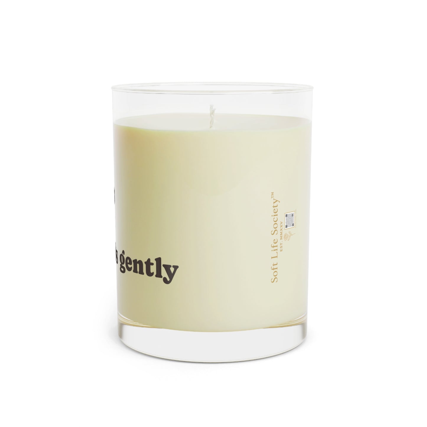 Candle with a Soft Life Society logo on a white background