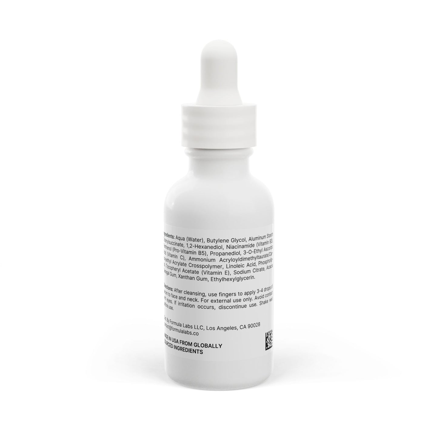 White dropper bottle with label on a white background