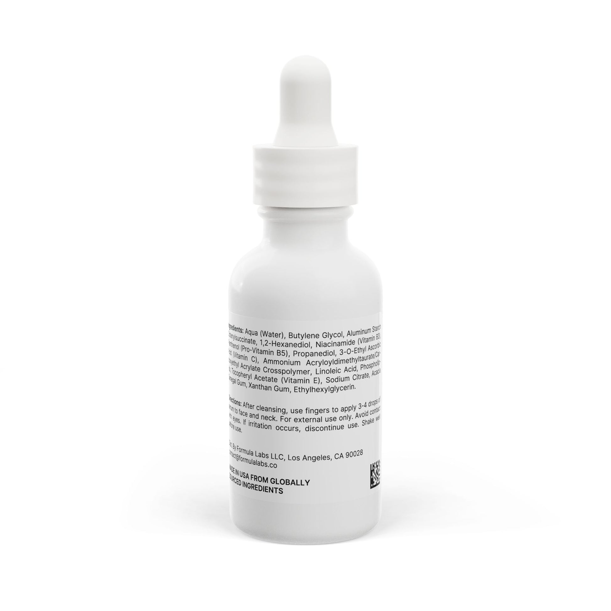 White dropper bottle with label on a white background