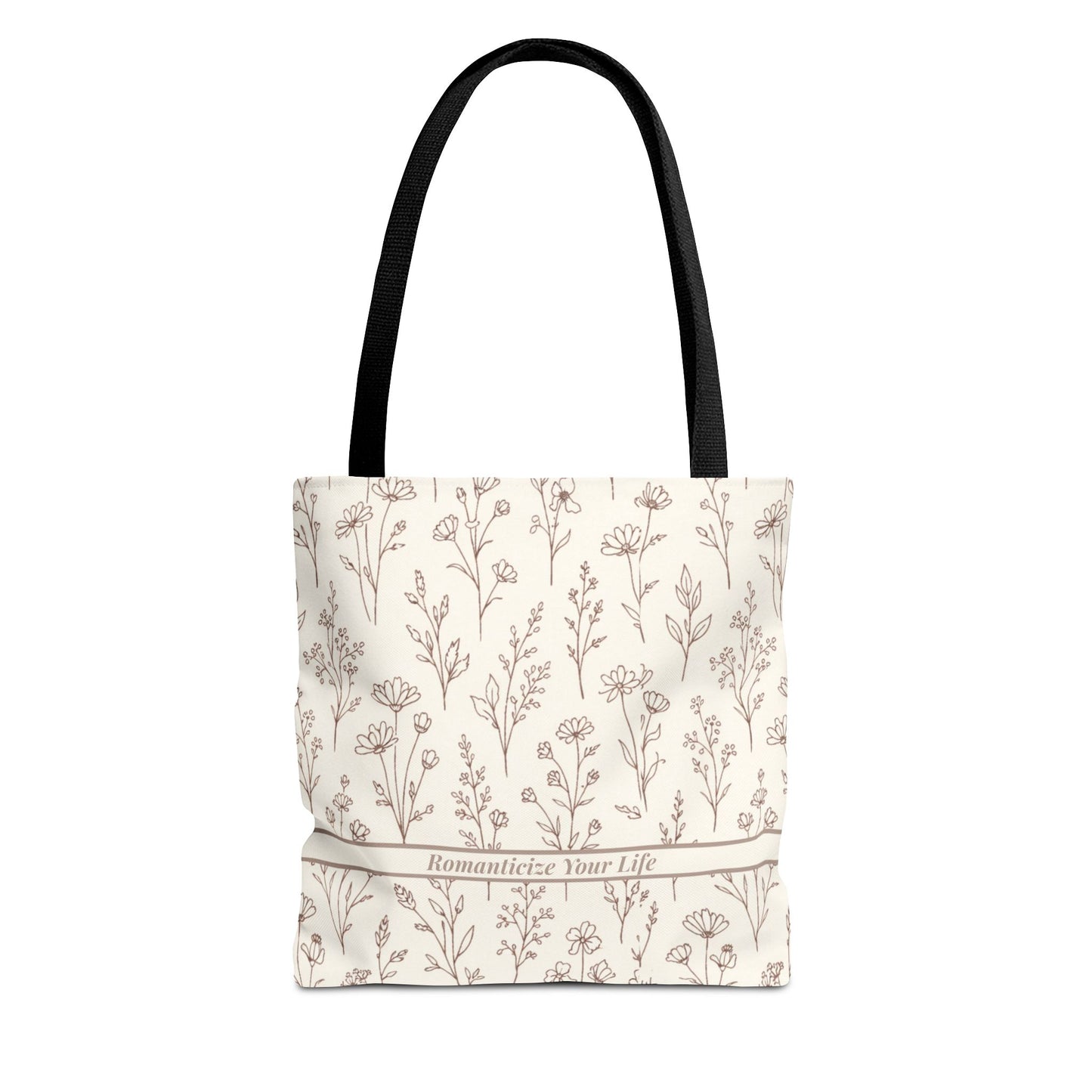 Floral aesthetic tote bag with black cotton handles on clean neutral studio background