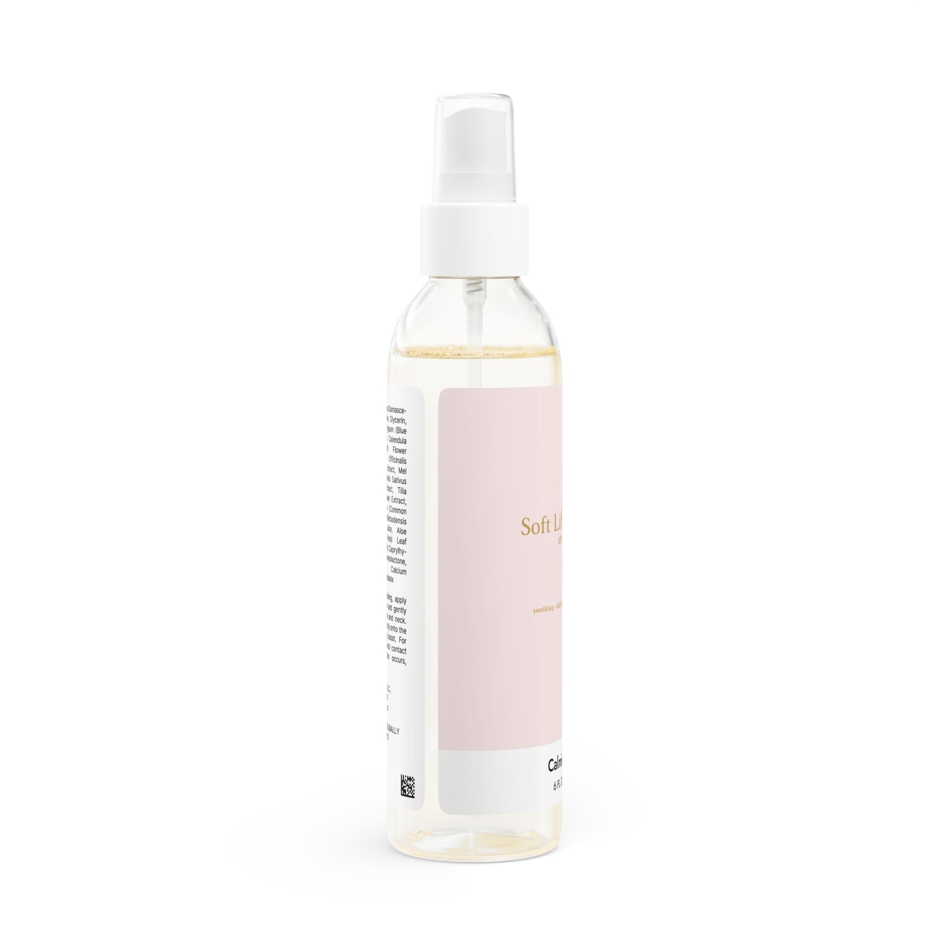 Soft Life Society spray bottle with a pink label on a white background