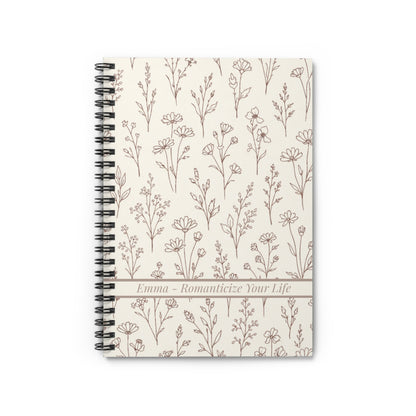 Notebook with floral pattern on a white background